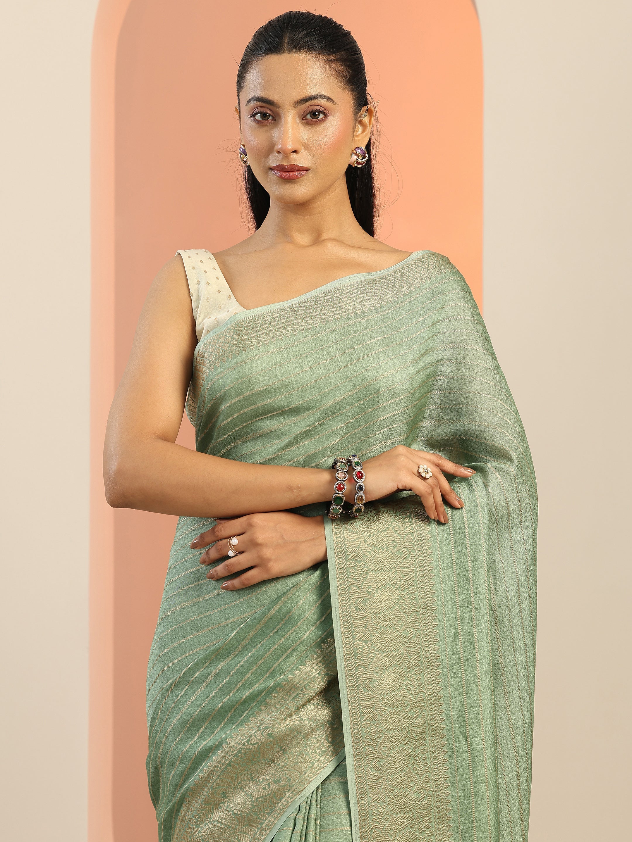Green Woven Design Georgette Saree With Unstitched Blouse Piece