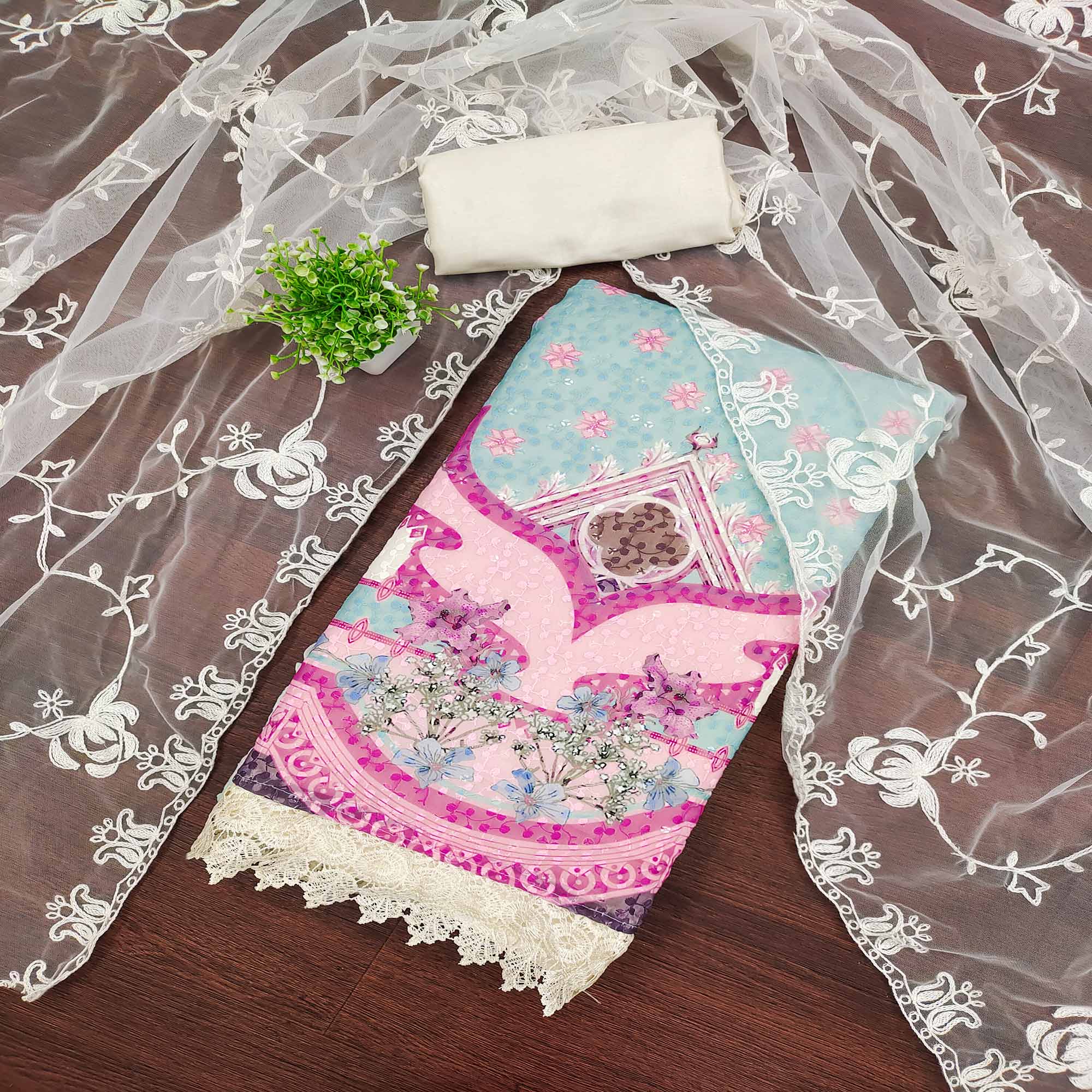 Cream & Sky Blue Georgette Suit Fabric Adorned with Elegant and Delicate Schiffli Embroidery