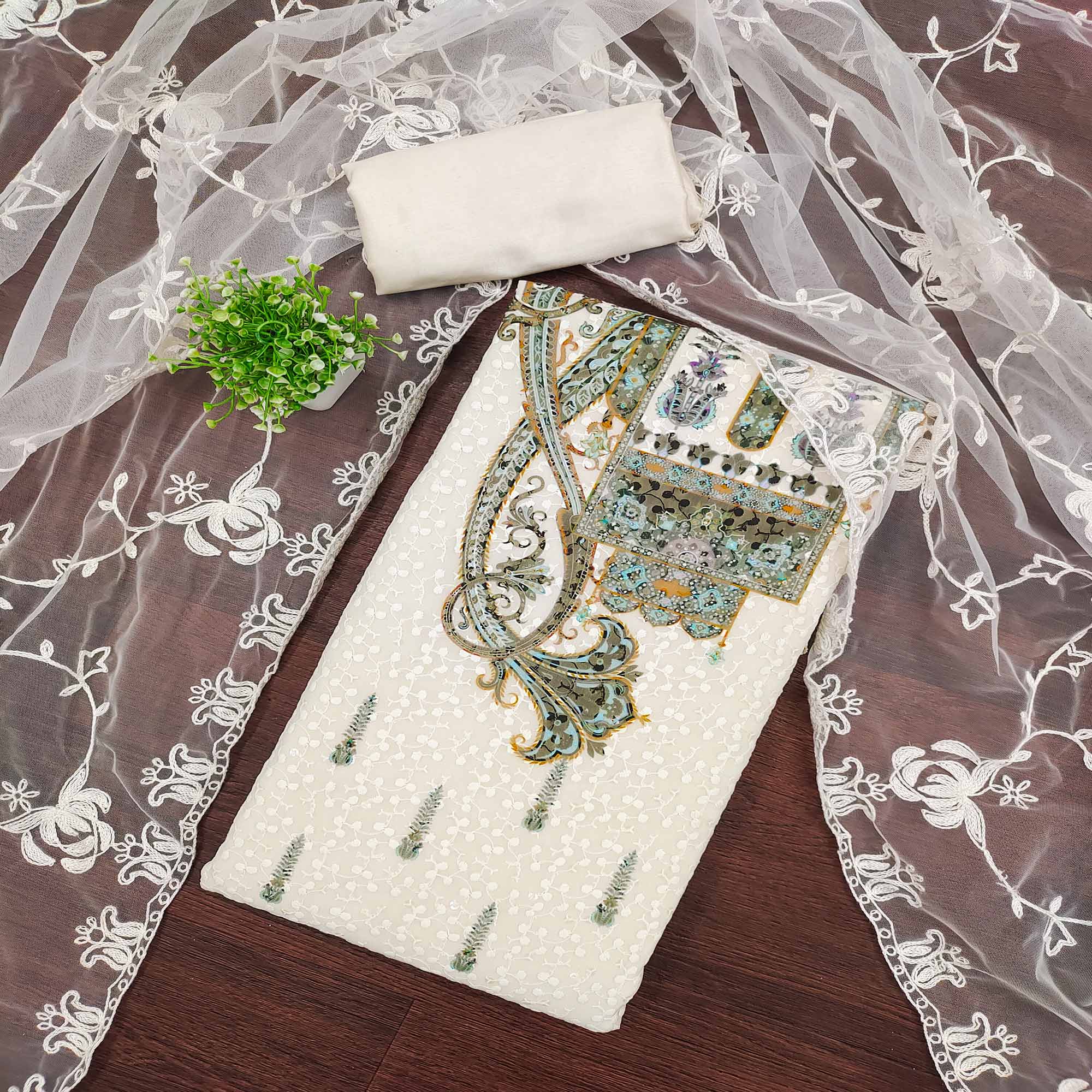 Cream And Green Schiffli Embroidered Heavy Georgette Dress Material