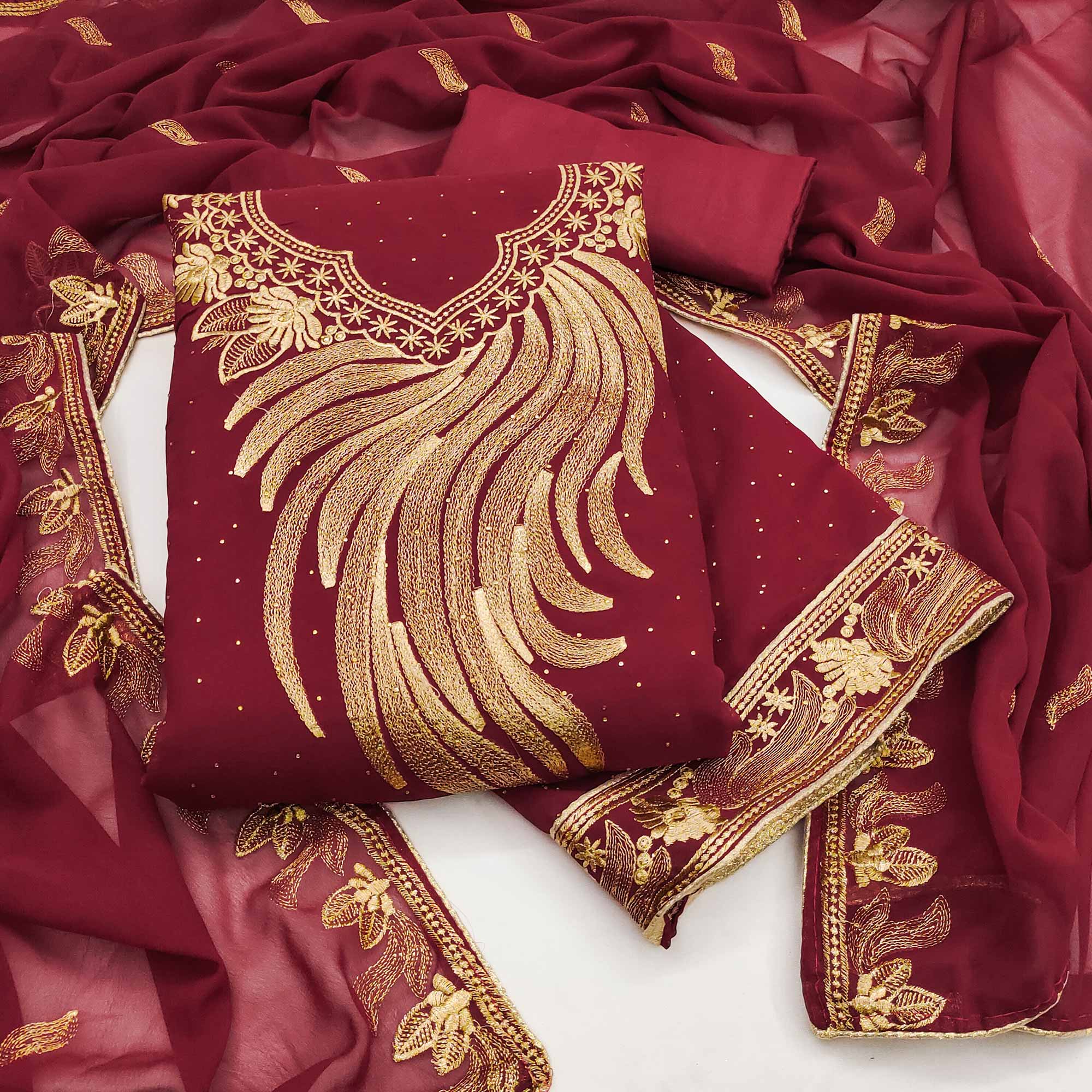 An Ethereal Charm Maroon Floral Embroidery With Stone Work Georgette Dress Material