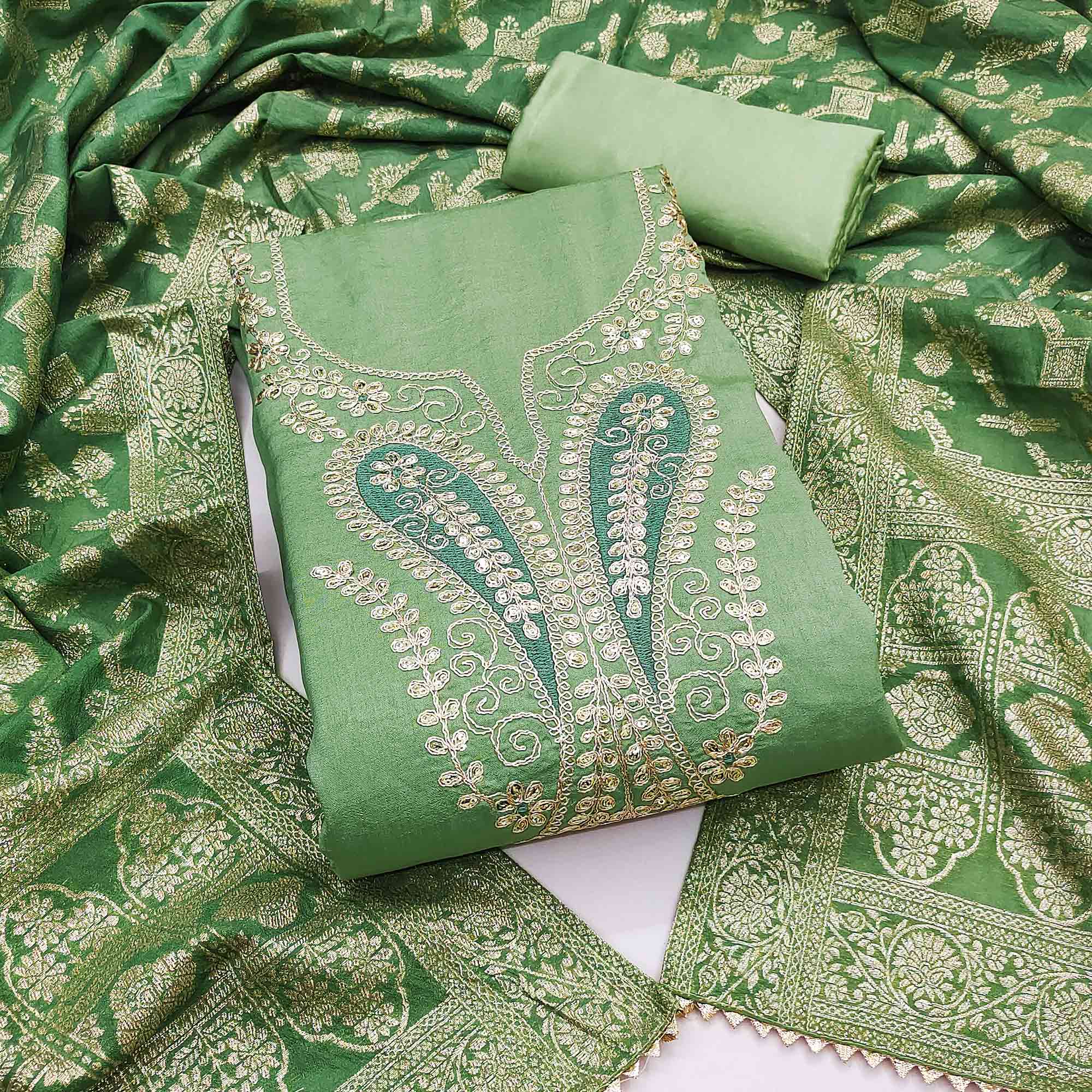 Green Vichitra Silk Dress Material Enhanced With Elegant Floral Sequins Cording Embroidery