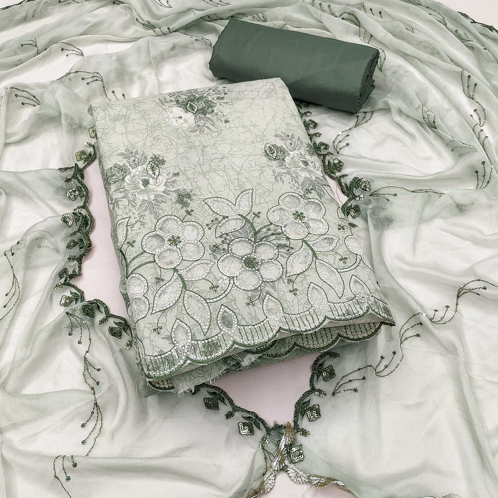 Green Floral Cambric Cotton Dress Material With Elegant Embroidery Work