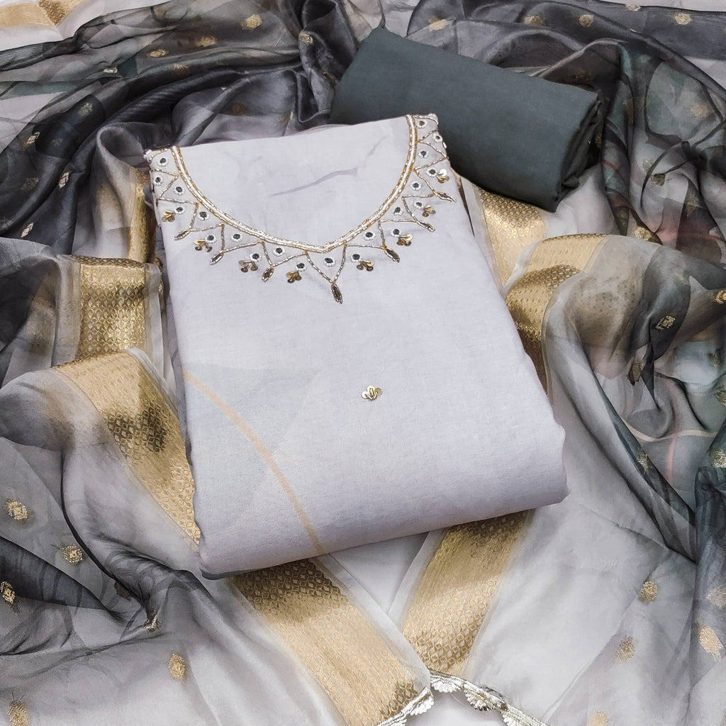 Grey Cambric Cotton Dress Material Adorned With Floral Prints & Hand Moti Embellishment