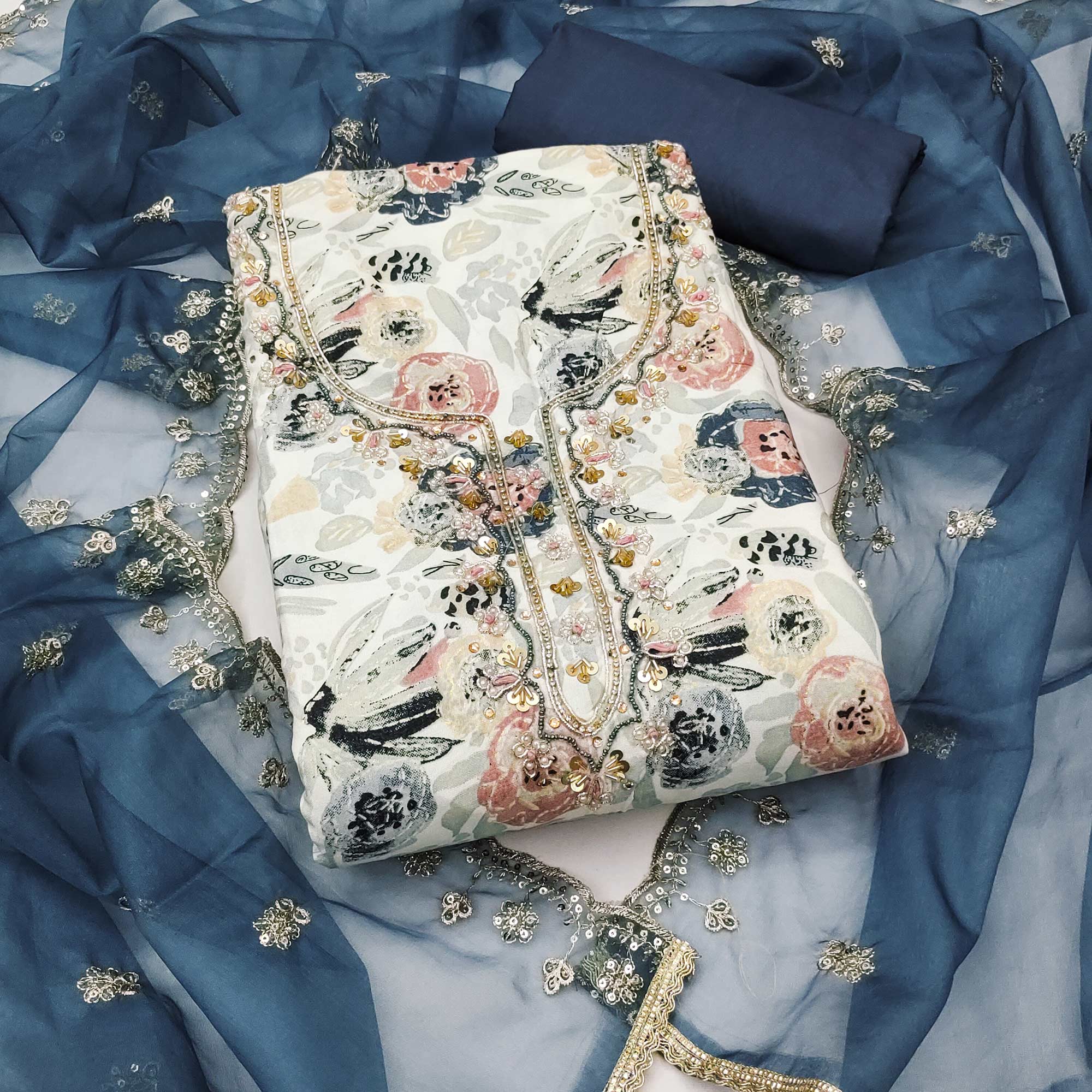 Blue Printed Blue Pure Cotton Dress Material Enhanced With Moti & Hand Embroidered Sequins