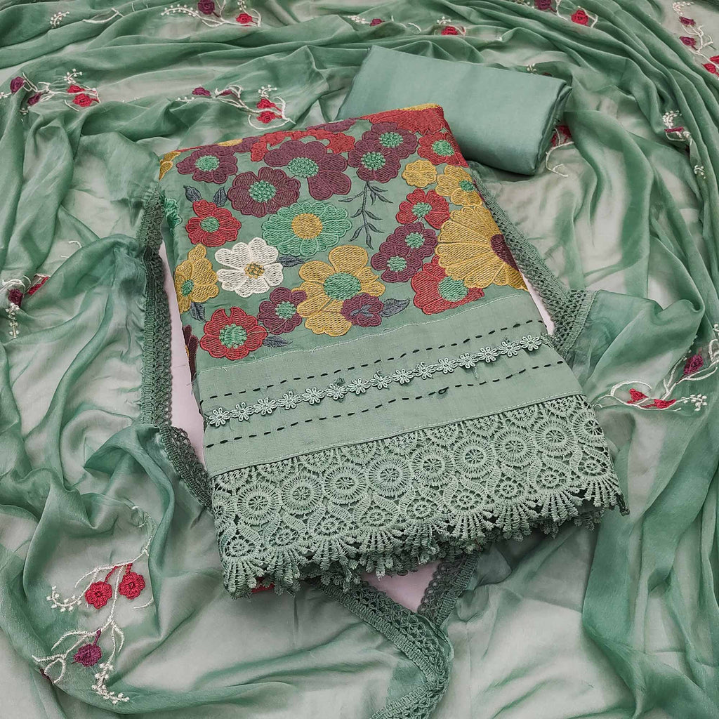 Green Roman Cotton Silk Dress Material Adorned With Elegant Floral Thread Embroidered Work