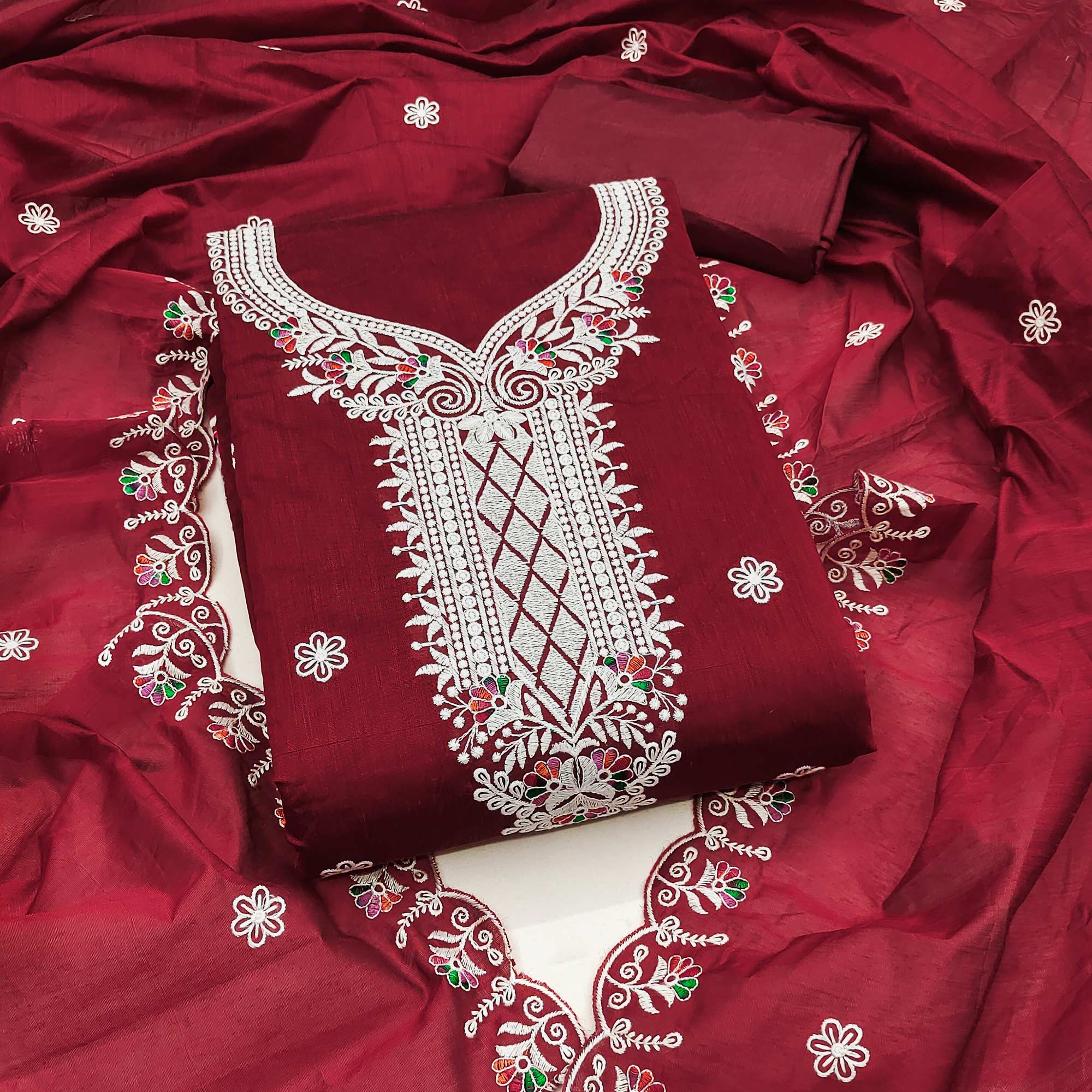 Maroon Cambric Cotton Dress Material With Elegant Floral Embroidery Work