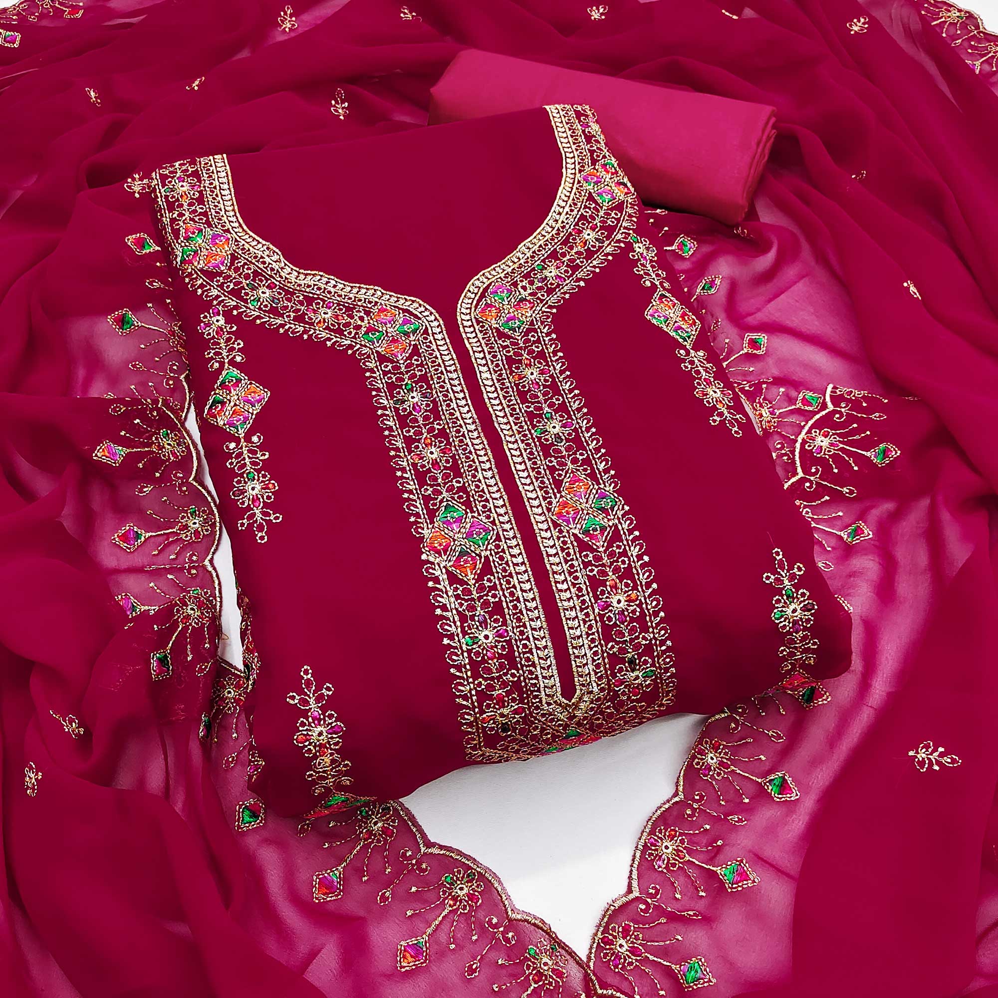 Pink Georgette Dress Material Enhanced With Graceful Floral Embroidery For An Elegant Ethnic Look