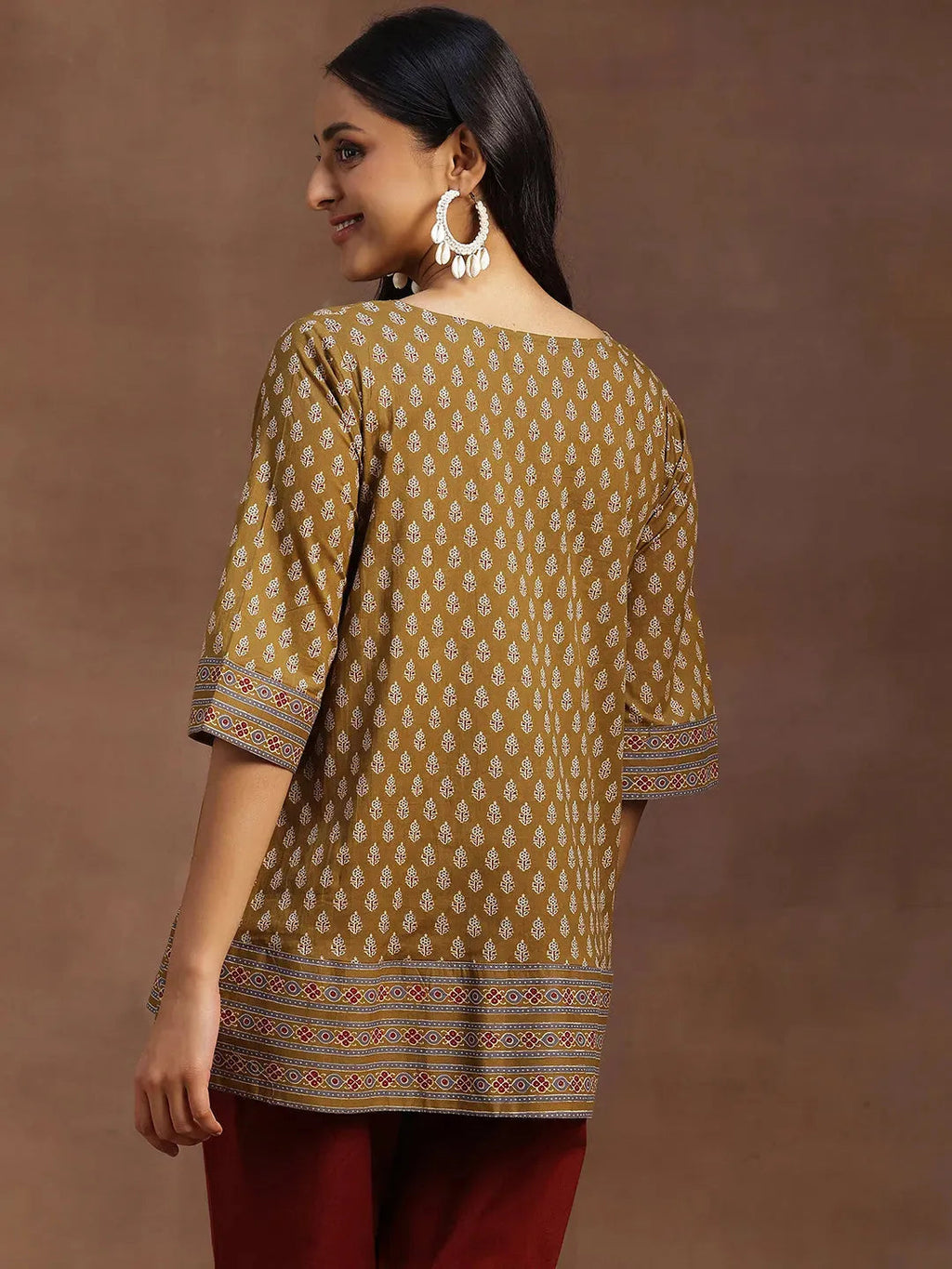 Mustard Printed Cotton A-line Kurti