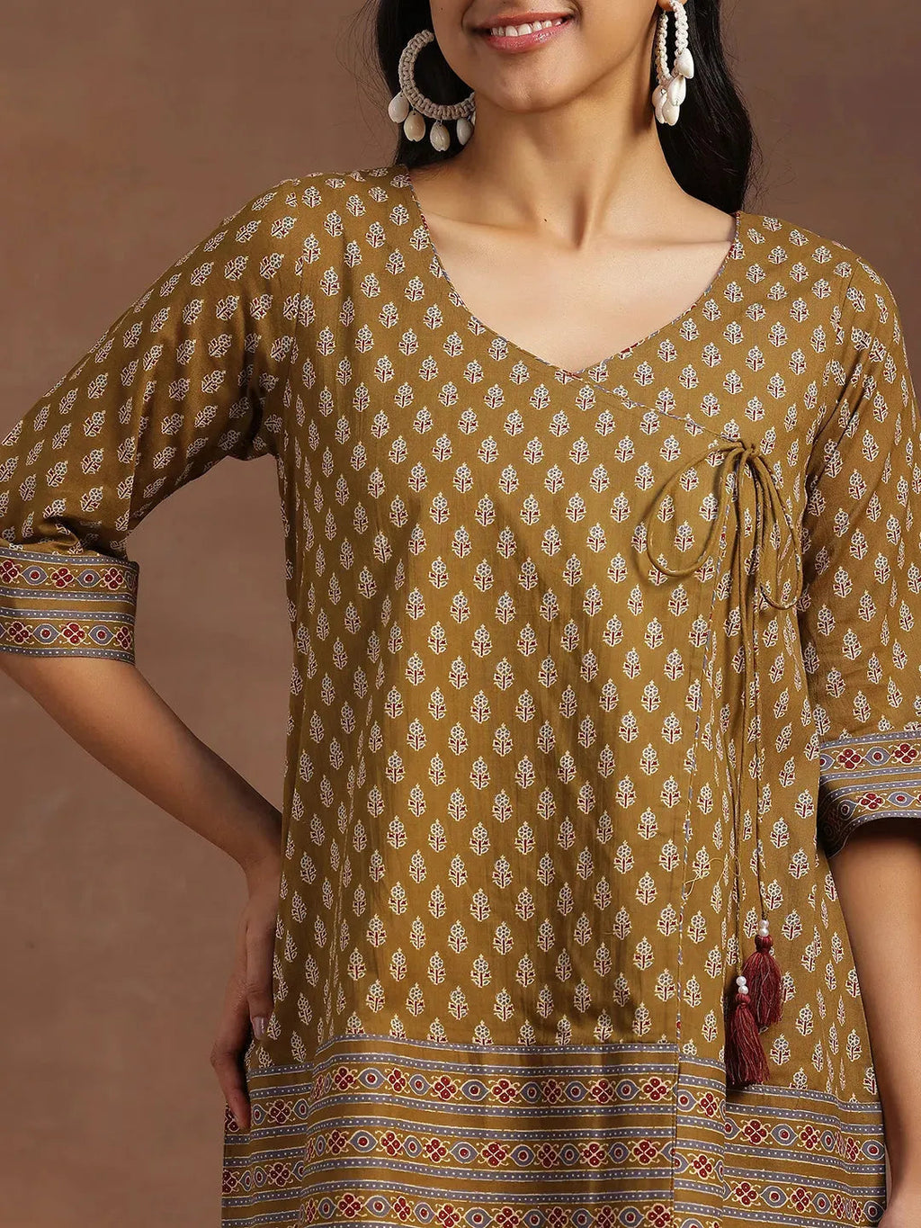 Mustard Printed Cotton A-line Kurti