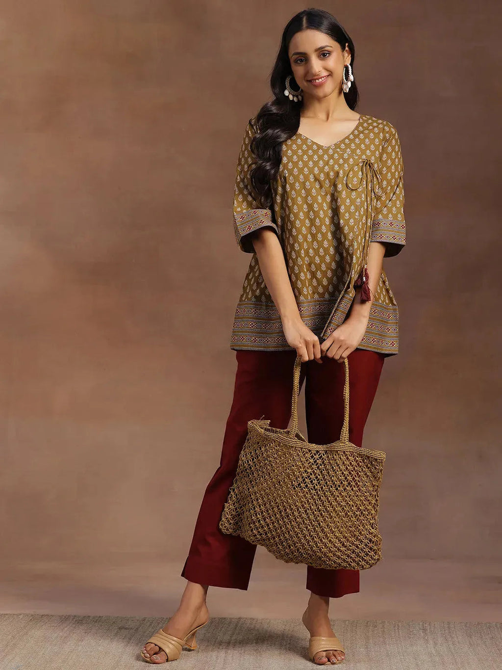 Mustard Printed Cotton A-line Kurti