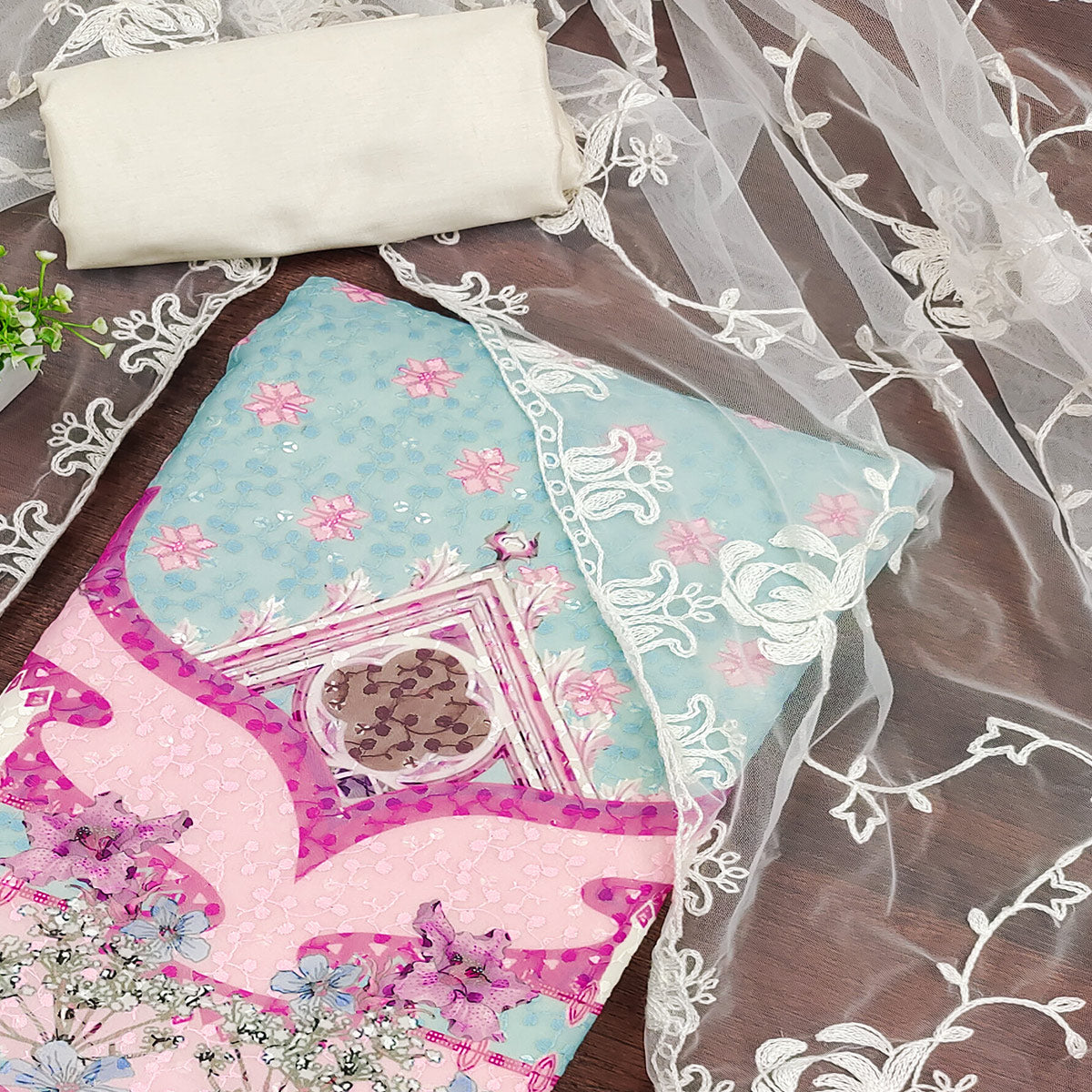 Cream & Sky Blue Georgette Suit Fabric Adorned with Elegant and Delicate Schiffli Embroidery