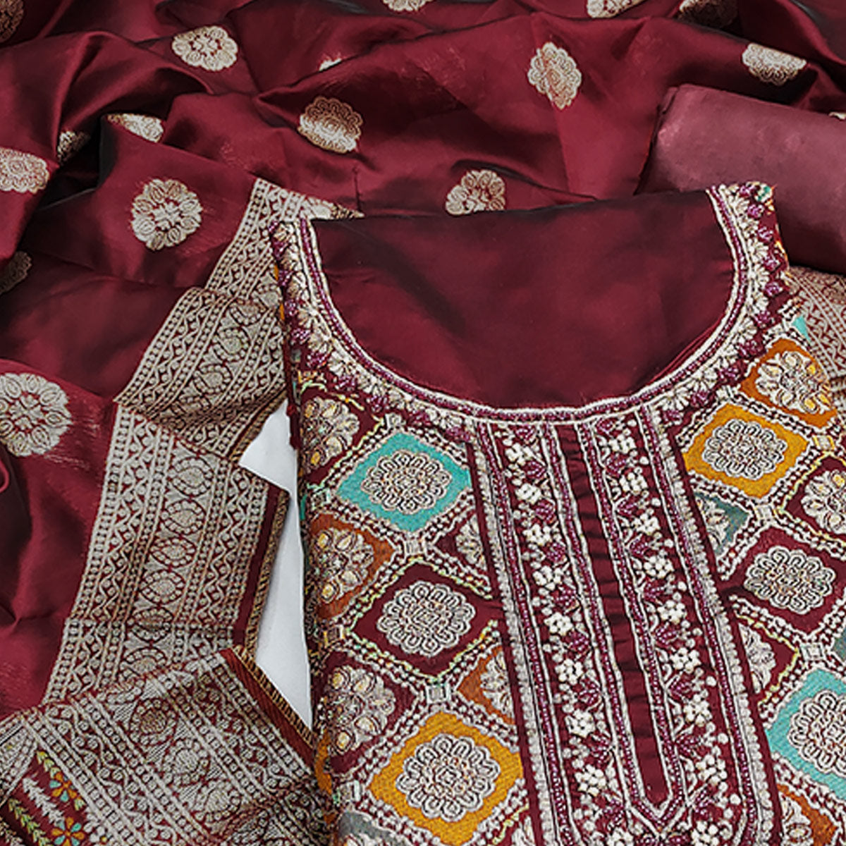 Maroon Unstitched Dress Material in Zari Woven Jacquard