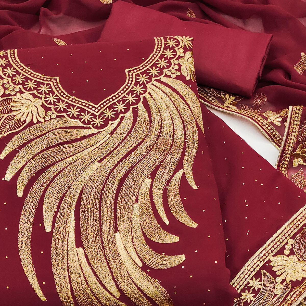 An Ethereal Charm Maroon Floral Embroidery With Stone Work Georgette Dress Material