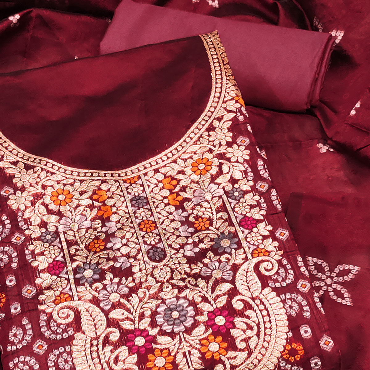 Maroon Banarasi Silk Jacquard Dress Material Adorned With Intricate Floral Zari Weaving