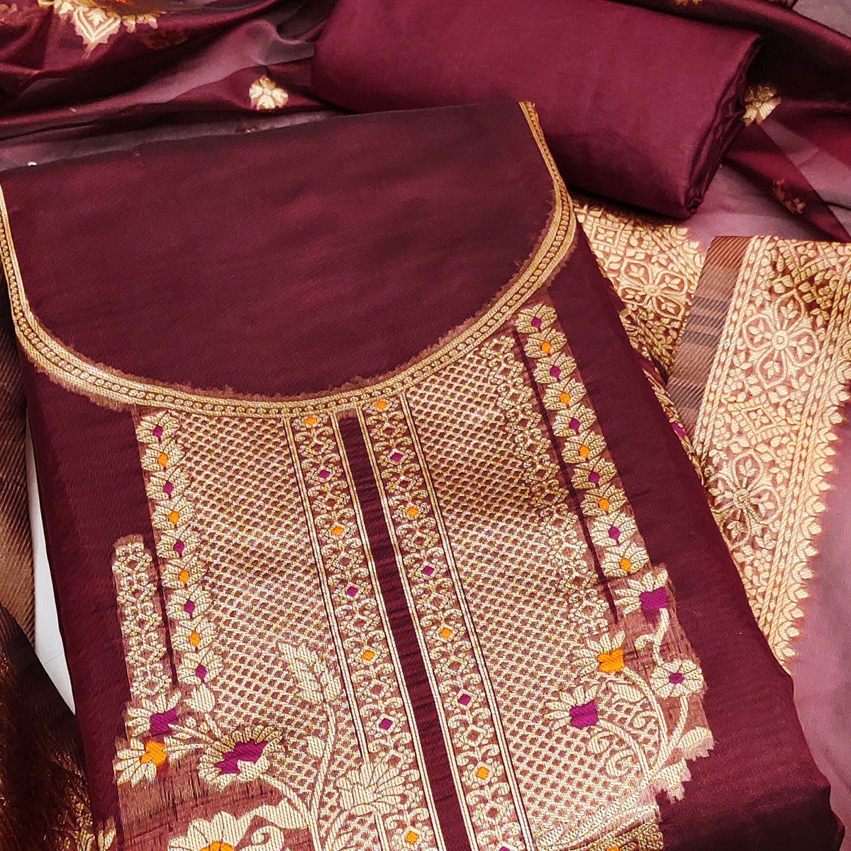 Maroon Organza Silk Dress Material Adorned With Exquisite Floral Zari Weaving Work