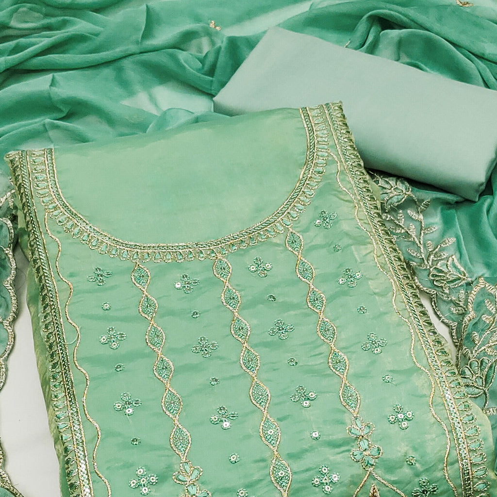 Green Floral Elegance With Sequins Embroidery On Viscose Satin Dress Material