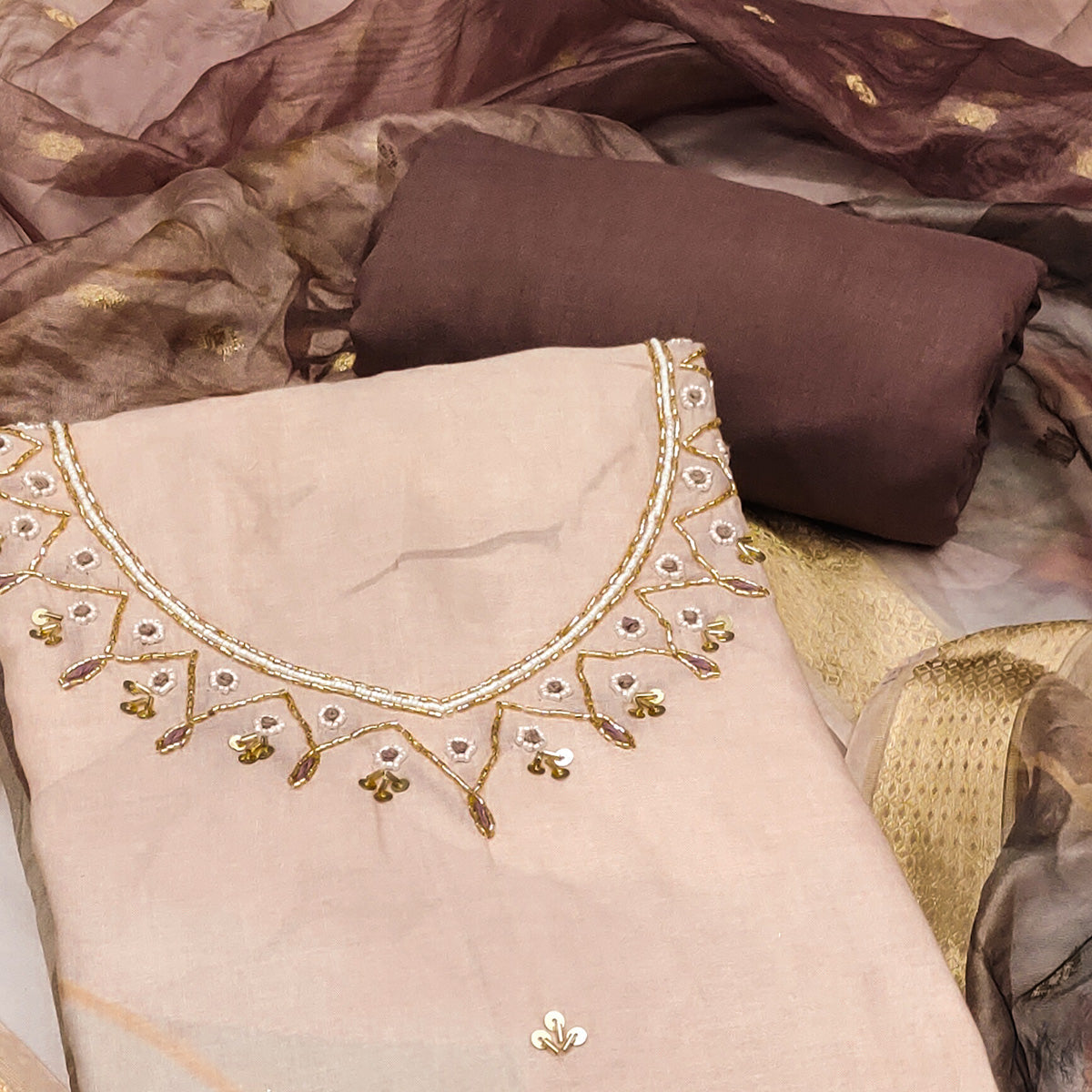 Brown Cambric Cotton Dress Material Adorned With Floral Prints & Hand Moti Embellishment