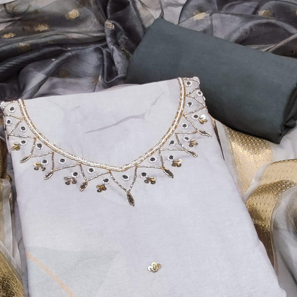 Grey Cambric Cotton Dress Material Adorned With Floral Prints & Hand Moti Embellishment
