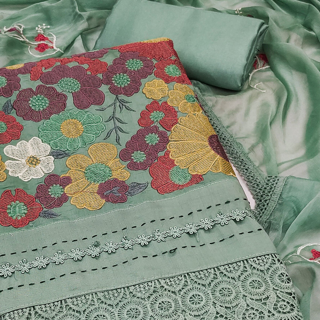 Green Roman Cotton Silk Dress Material Adorned With Elegant Floral Thread Embroidered Work