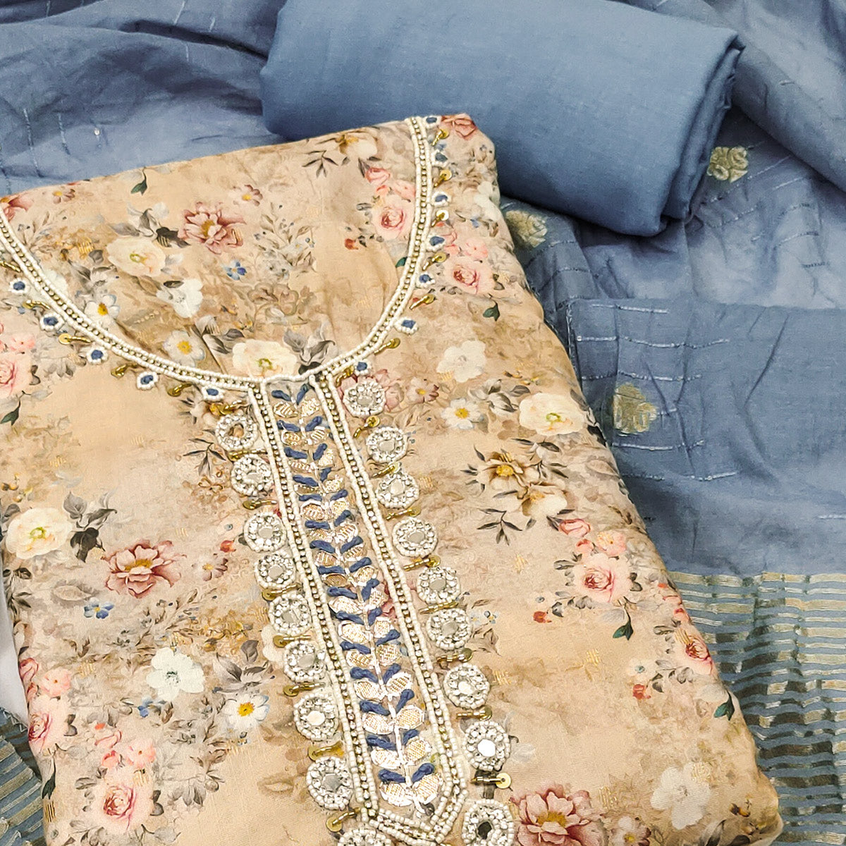 Chikoo Floral Digital Printed Cotton Blend Dress Material Embellished With Moti Hand Embroidery