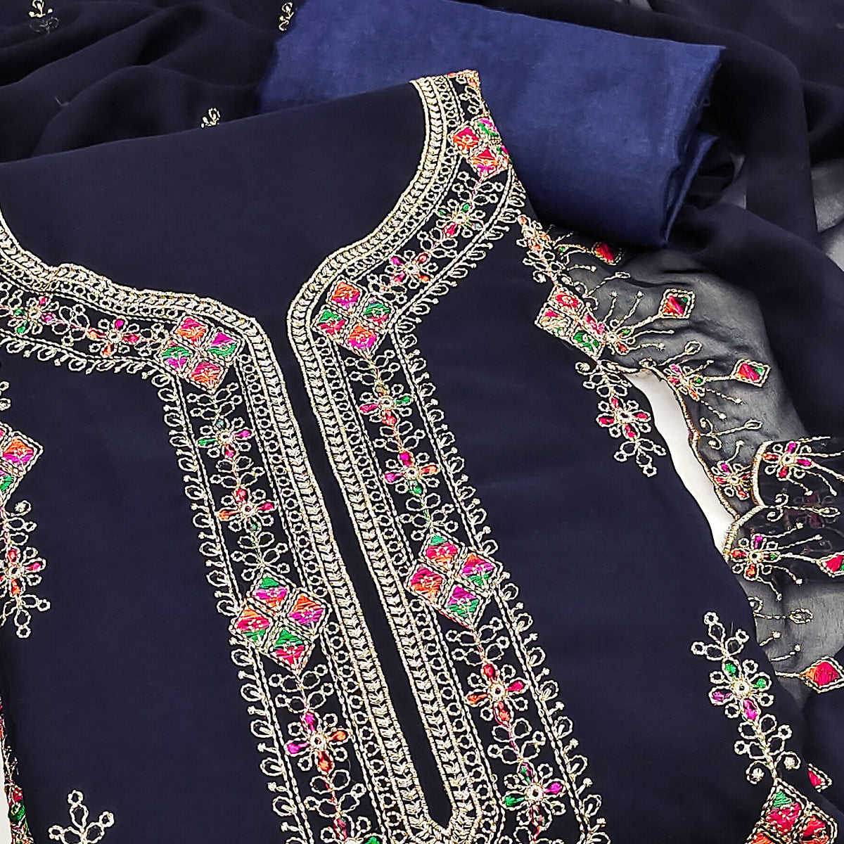 Blue Georgette Dress Material Enhanced With Graceful Floral Embroidery For An Elegant Ethnic Look