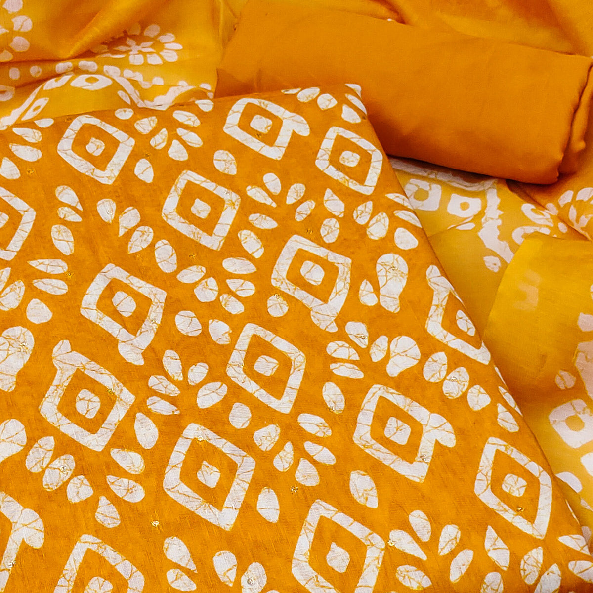 Mustard Yellow Chanderi Silk Dress Material With Traditional Batik Prints