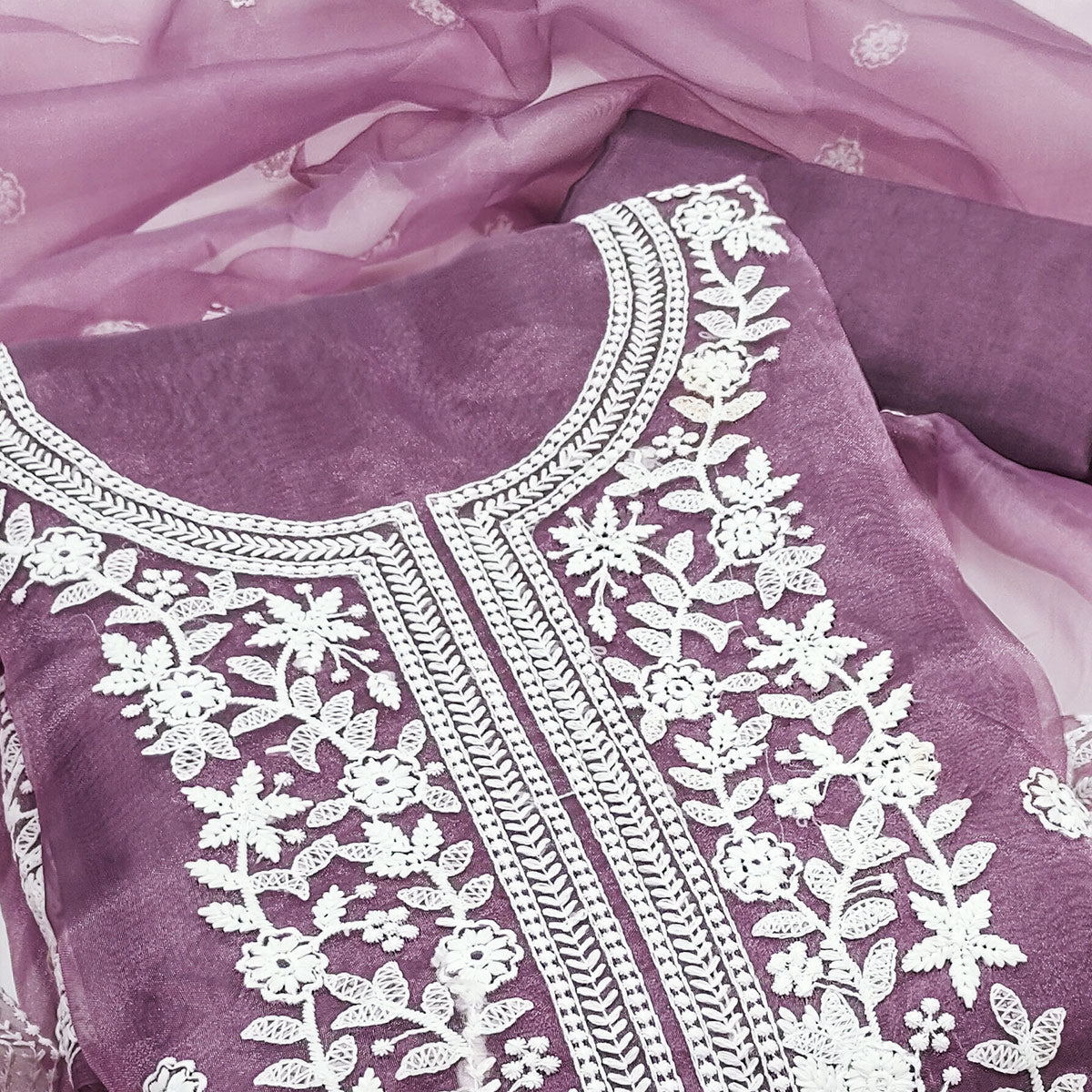 An Ethereal Charm Purple Floral Thread Embroidered Organza Dress Material