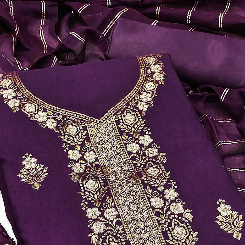 Elegant Royal Wine Banarasi Jacquard Dress Material Adorned With Ornate Zari Floral Weaves