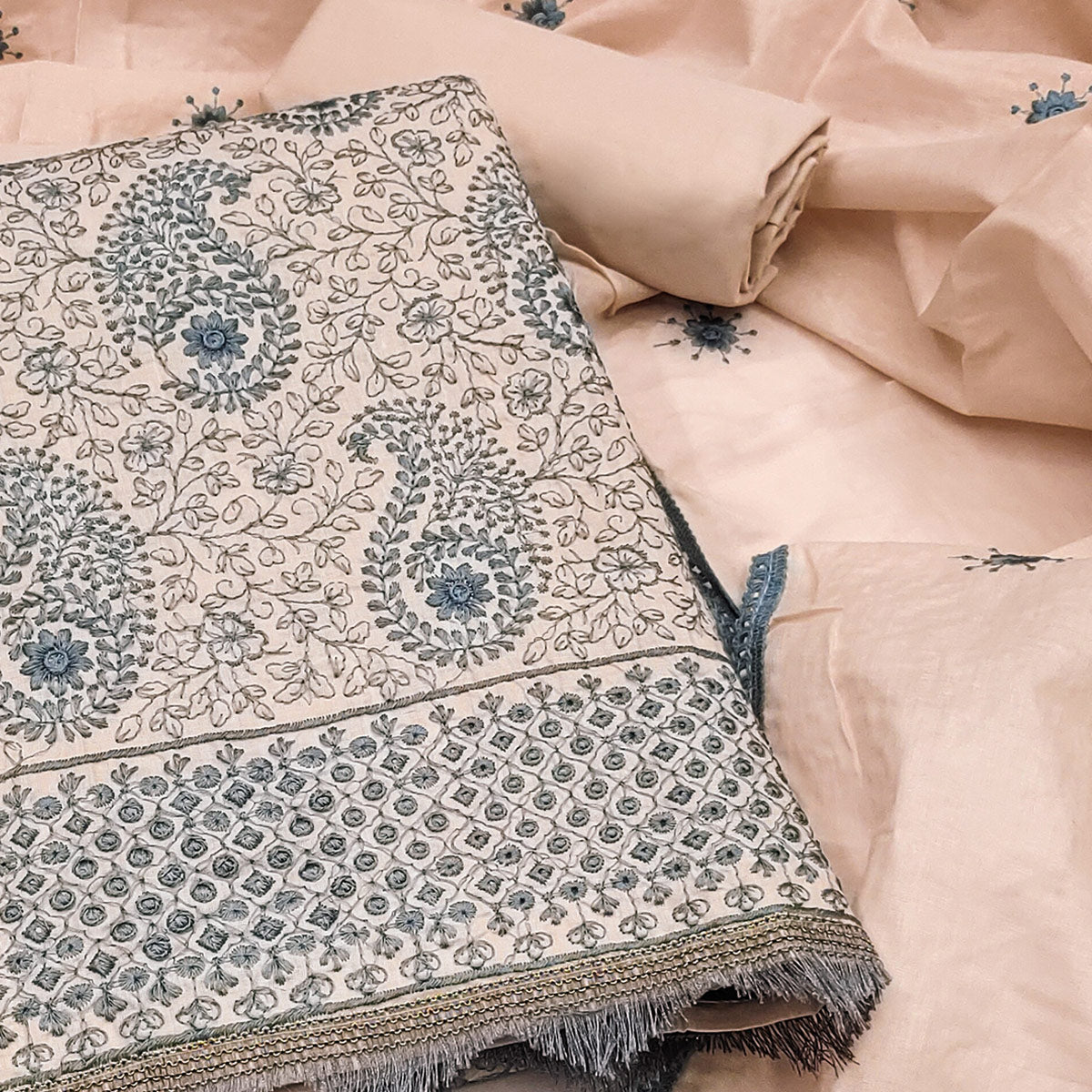 Peach Dress Material In Cotton Blend With Graceful Floral Thread Embroidery