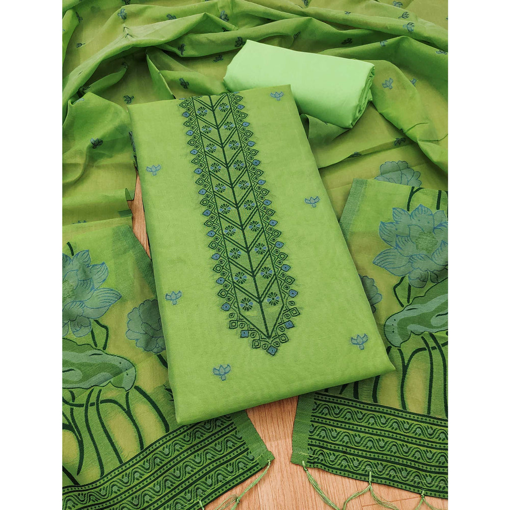 Green Ethnic Dress Material Showcasing Handloom Style Floral Zari Weaving