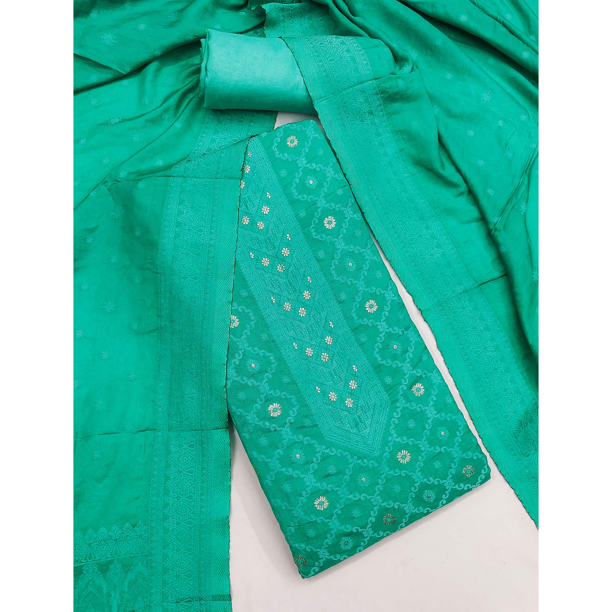 Banarasi Inspired Turquoise Jacquard Fabric for Elegant Ensembles