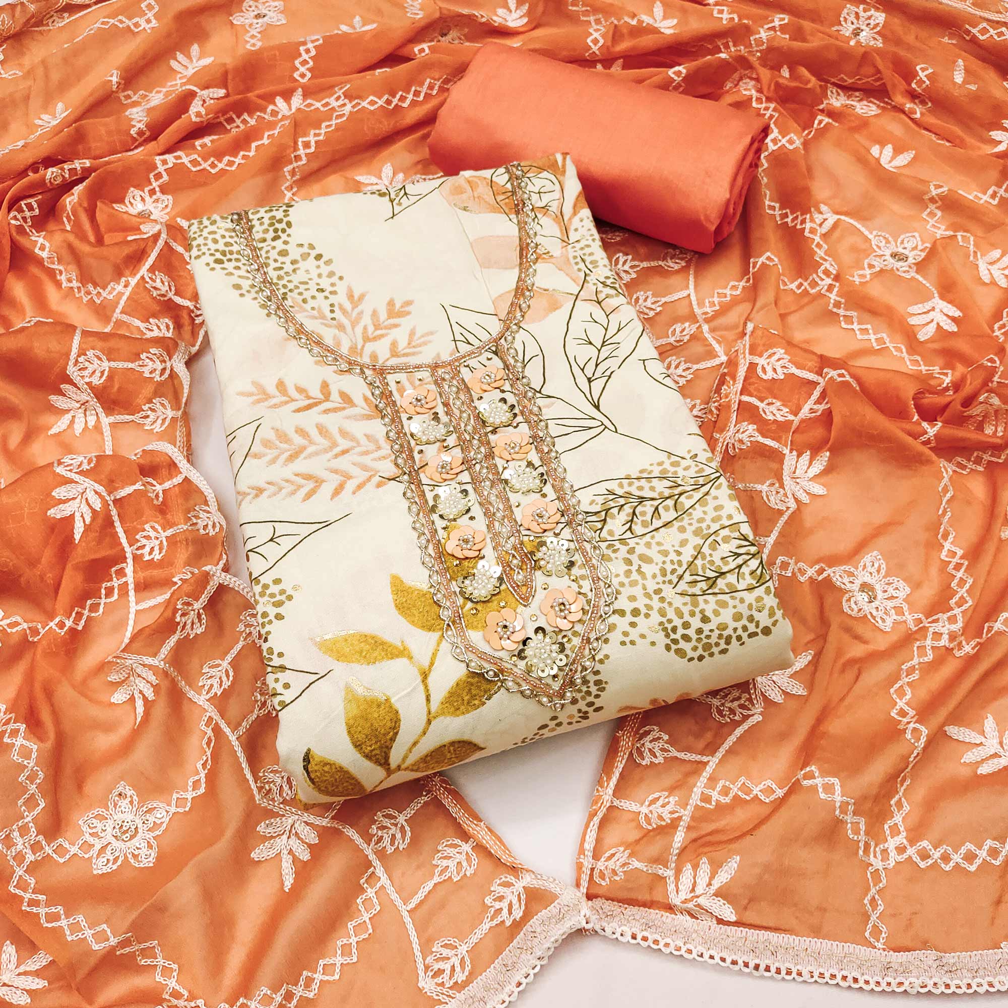 Cream & Orange Floral Printed Pure Cotton Dress Material With Intricate Moti & Stones work