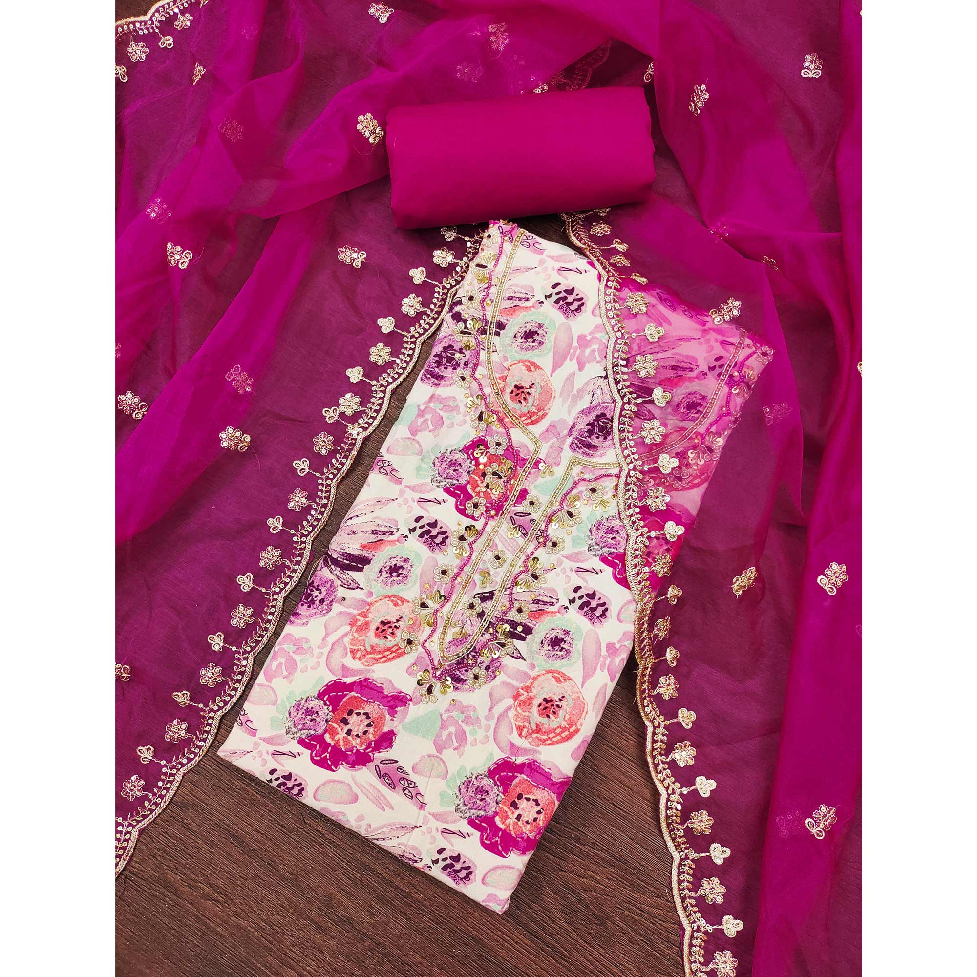 Pink Printed Blue Pure Cotton Dress Material Enhanced With Moti & Hand Embroidered Sequins