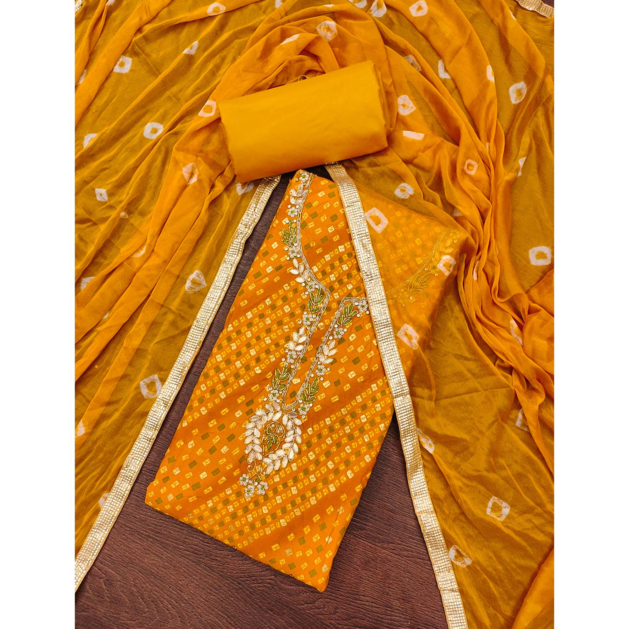 Mustard Bandhani Printed Pure Cotton Dress Material With Intricate Moti & Gota Patti Handwork