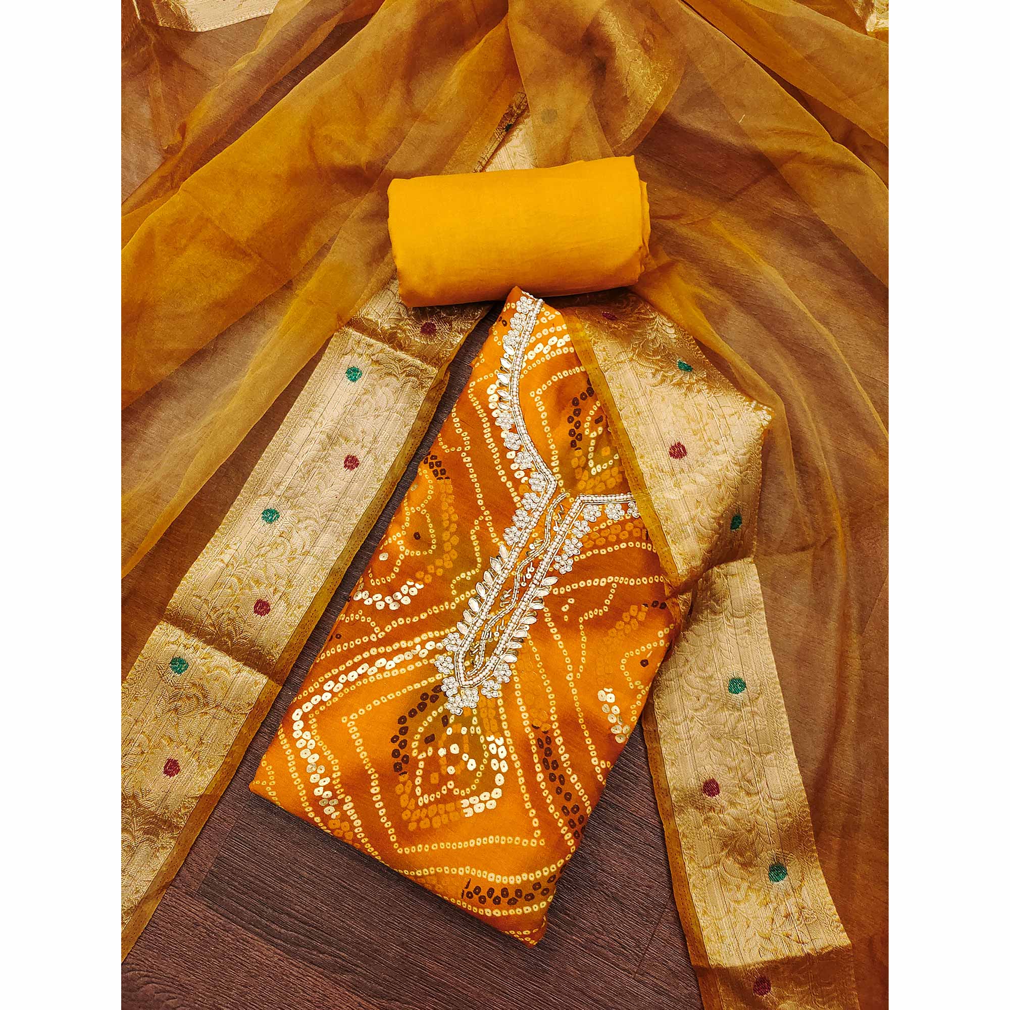 Mustard Bandhani Printed Pure Cotton Dress Material With Artistic Moti & Gota Patti Handwork