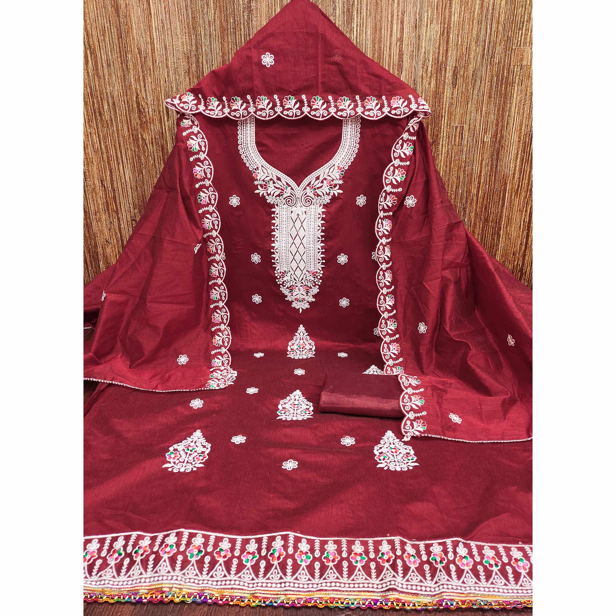 Maroon Cambric Cotton Dress Material With Elegant Floral Embroidery Work
