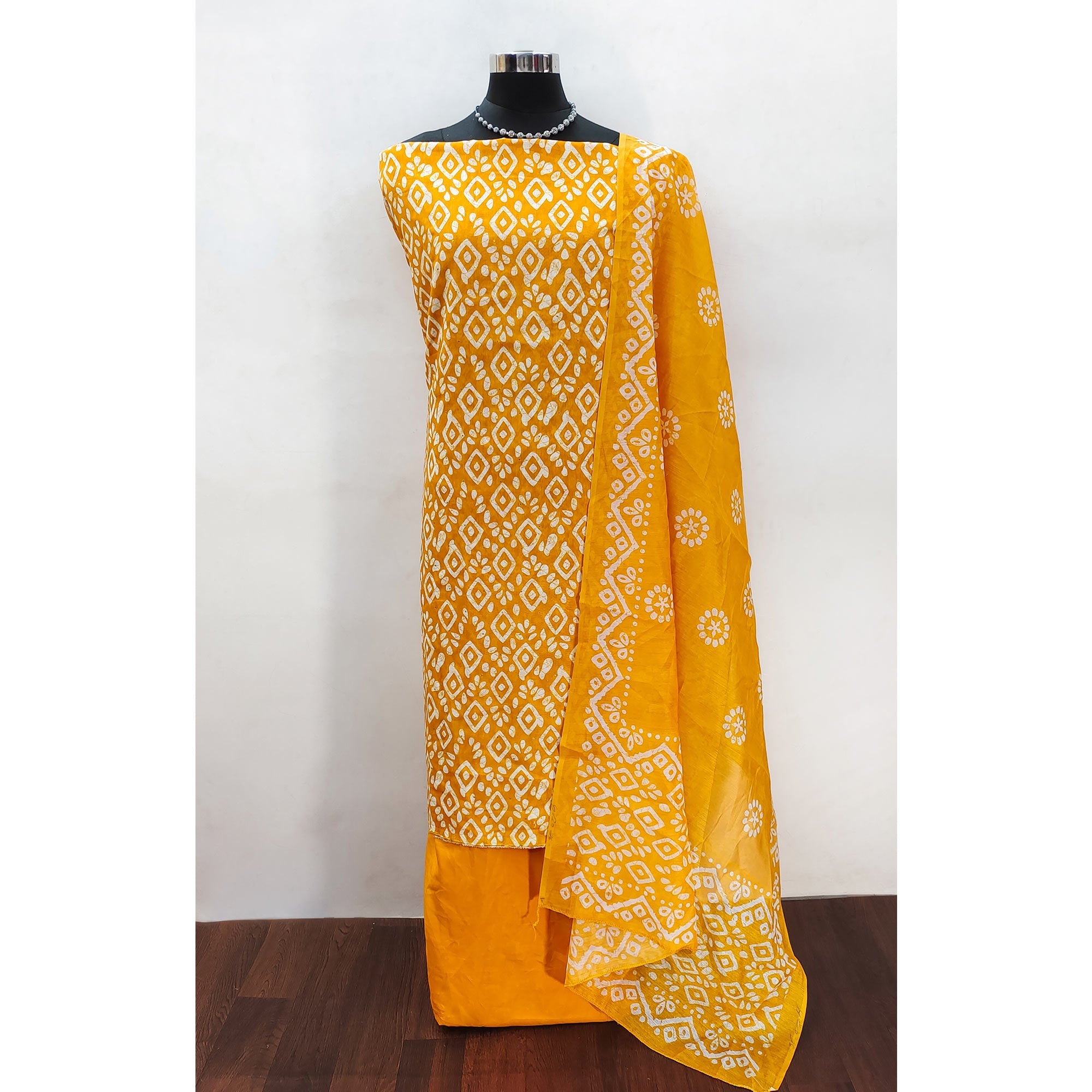 Mustard Yellow Chanderi Silk Dress Material With Traditional Batik Prints