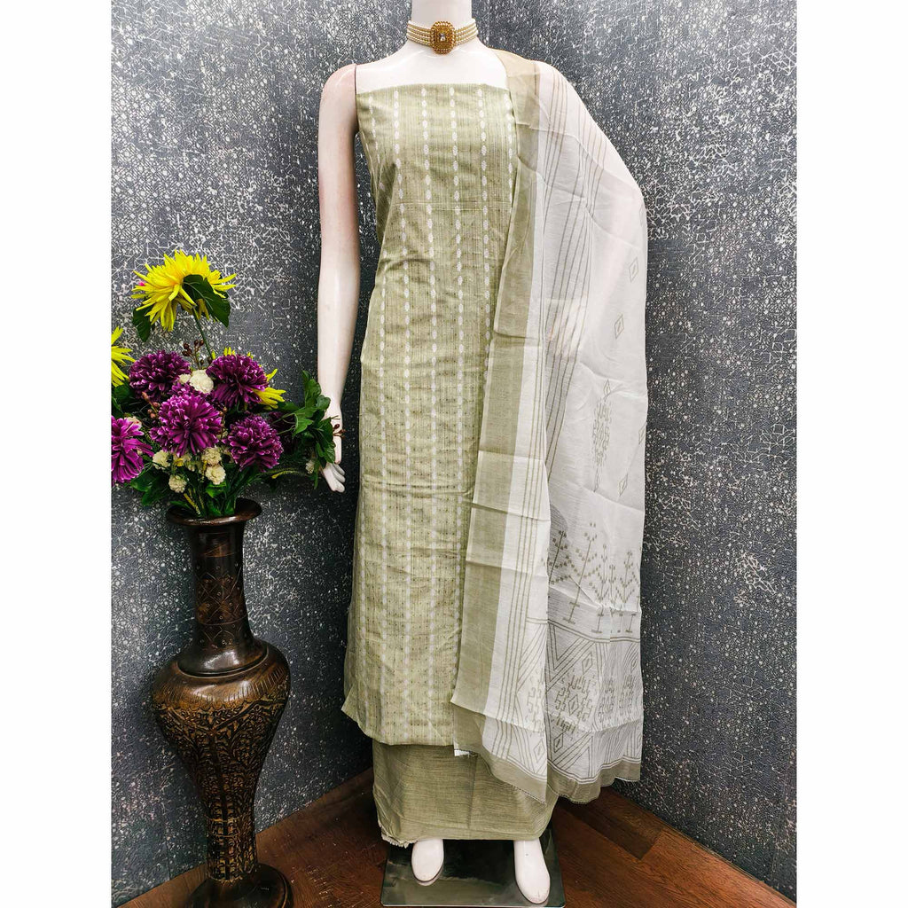 Classic Green Pure Cotton Dress Material Featuring Intricate Weaving