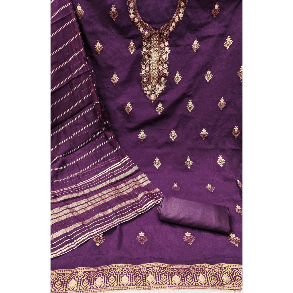 Elegant Royal Wine Banarasi Jacquard Dress Material Adorned With Ornate Zari Floral Weaves