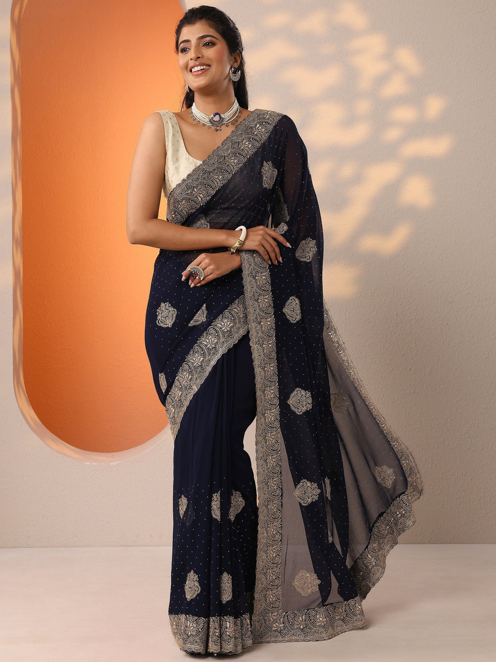 Navy Blue Embroidered Georgette Saree With Unstitched Blouse Piece