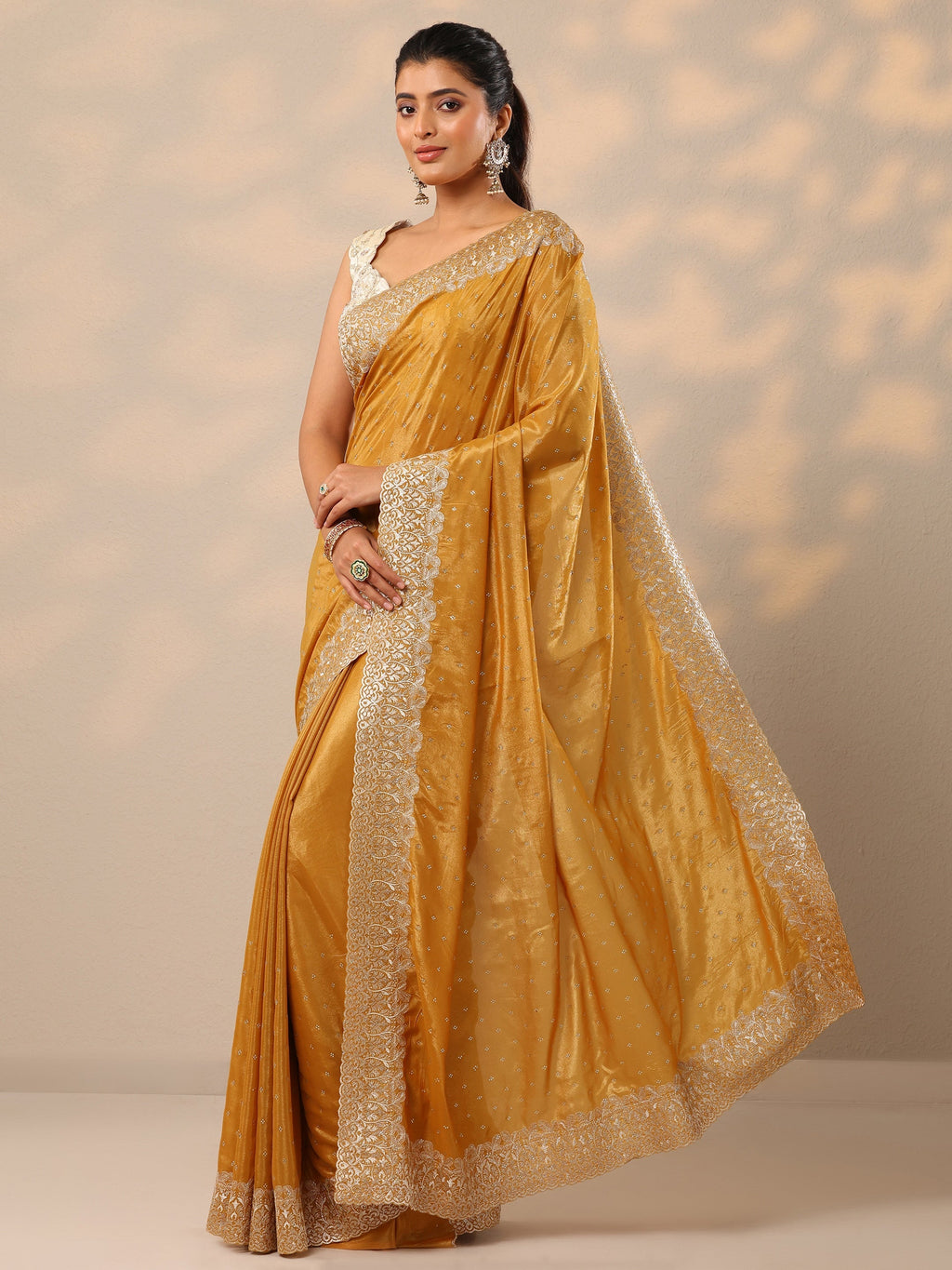 Mustard Embellished Crepe Sarees With Unstitched Blouse Piece