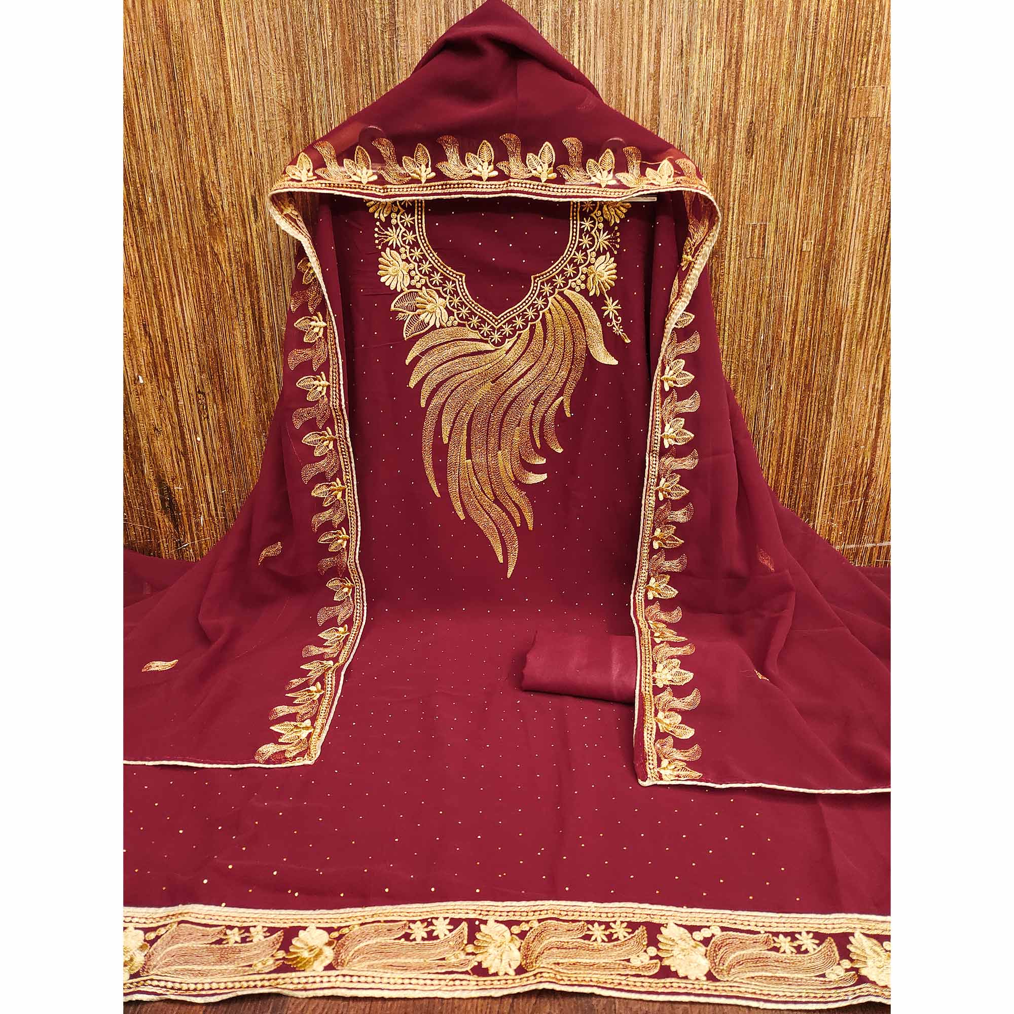 An Ethereal Charm Maroon Floral Embroidery With Stone Work Georgette Dress Material