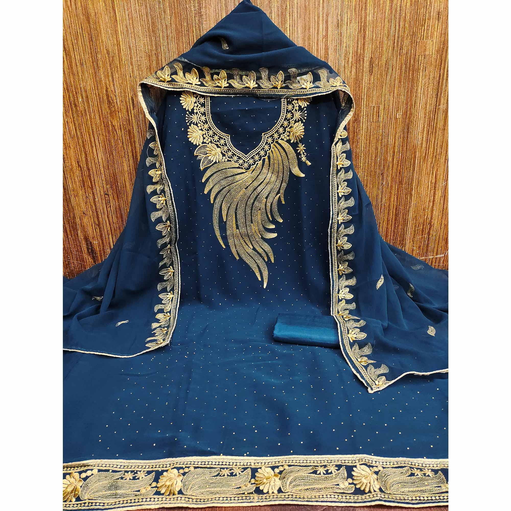 A Mesmerizing Creation Morpich Blue Floral Embroidery With Stone Work Georgette Dress Material