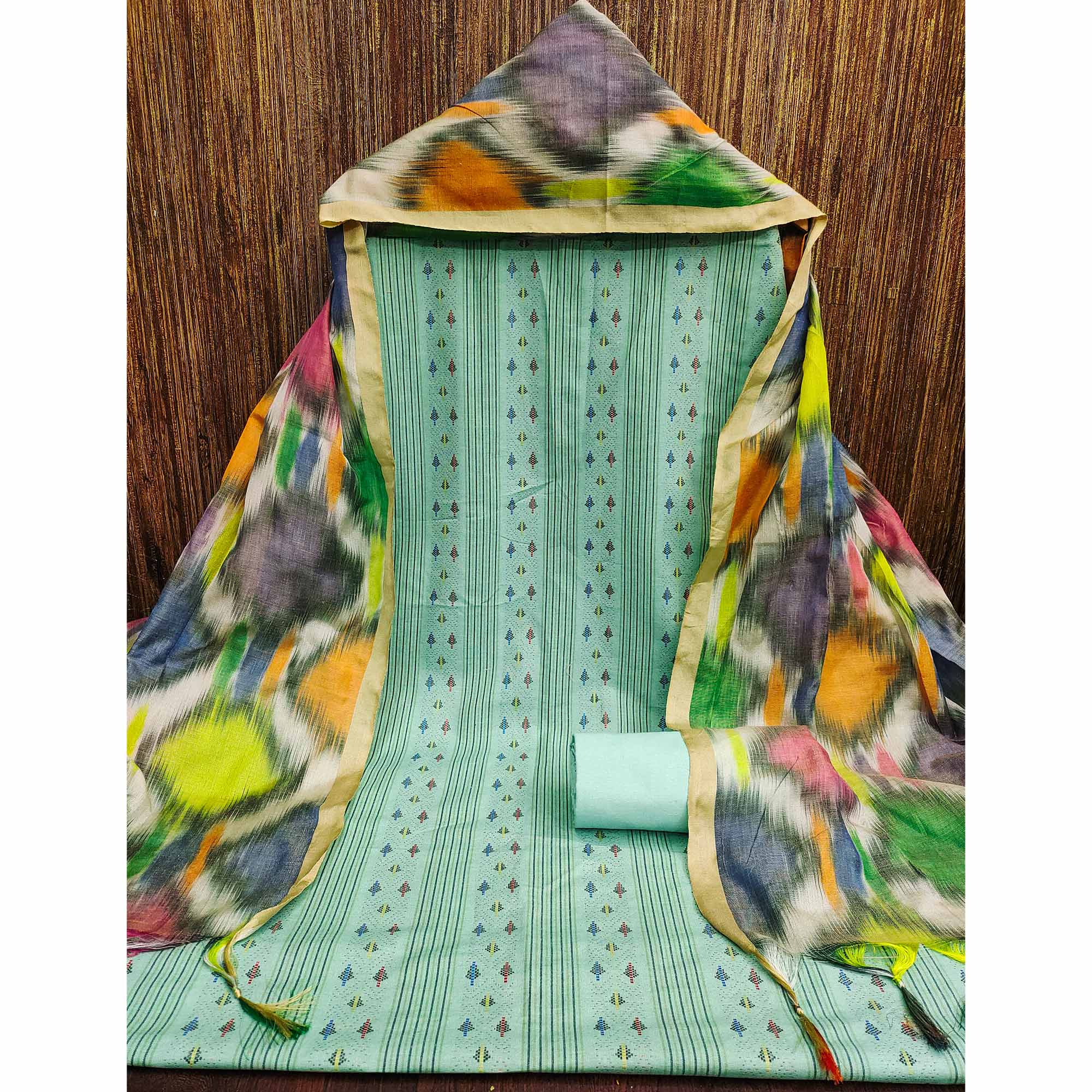 Make a Statement With Turquoise Woven Cotton Blend Dress Material