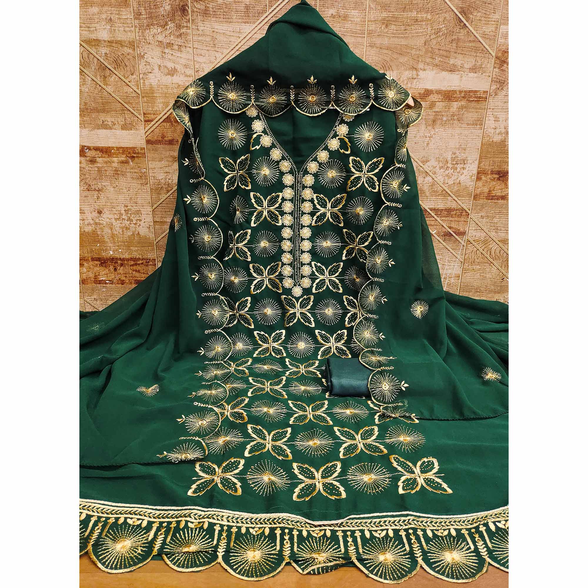 Green Georgette Dress Material Featuring Delicate Floral Zari Embroidery