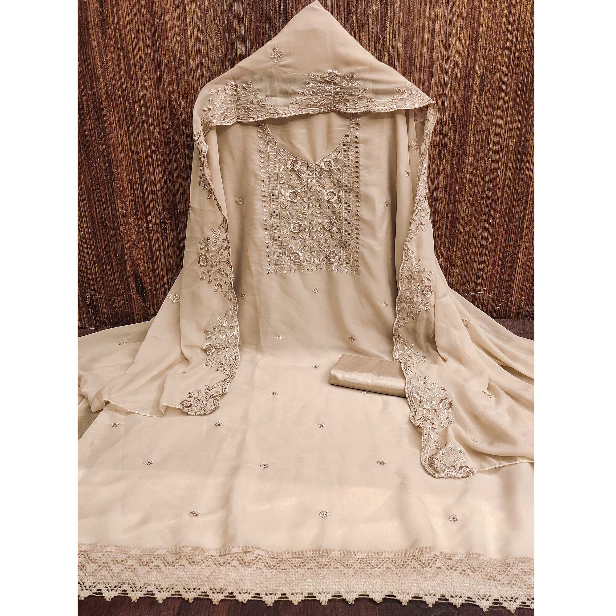 Chikoo Georgette Dress Material With Intricate Floral Zari Embroidery & Sequins Work