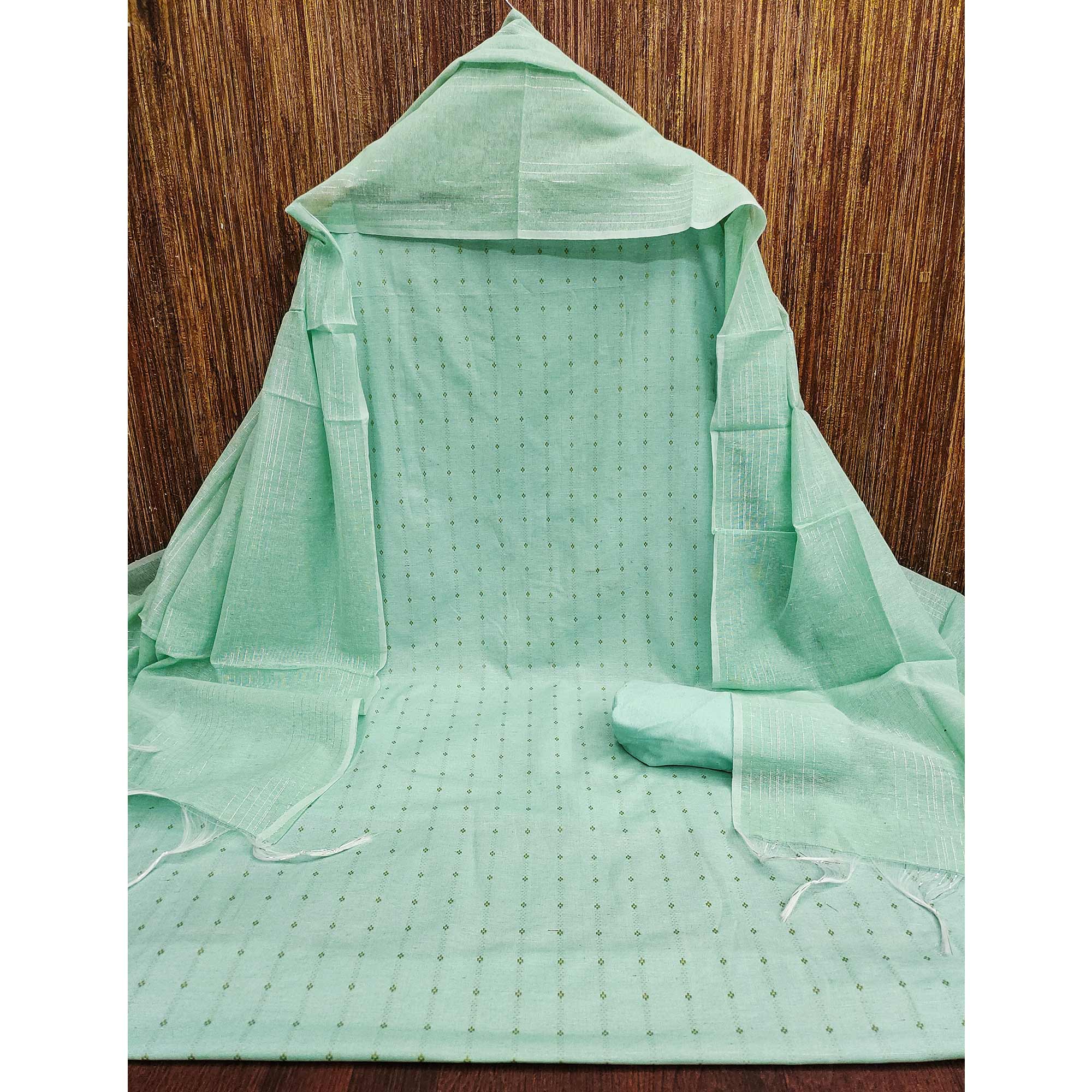 Graceful Turquoise Woven Poly Cotton Blend Dress Material