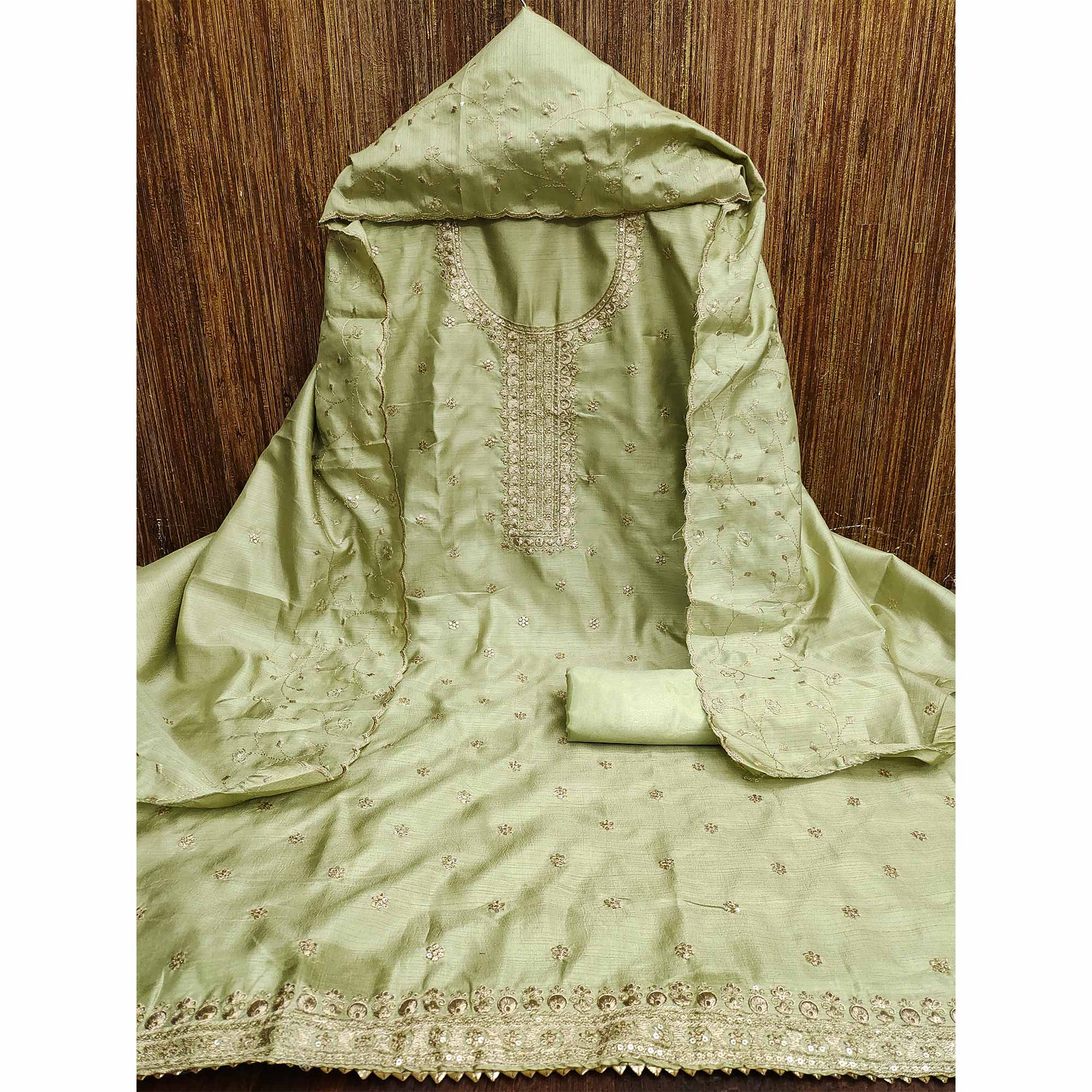 Light Green Cotton Silk Unstitched Dress Material Featuring Delicate Jalpari Embroidery