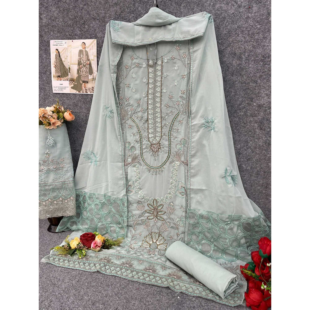 Muted Green Floral Design Dress Material Crafted from Lightweight Georgette Fabric