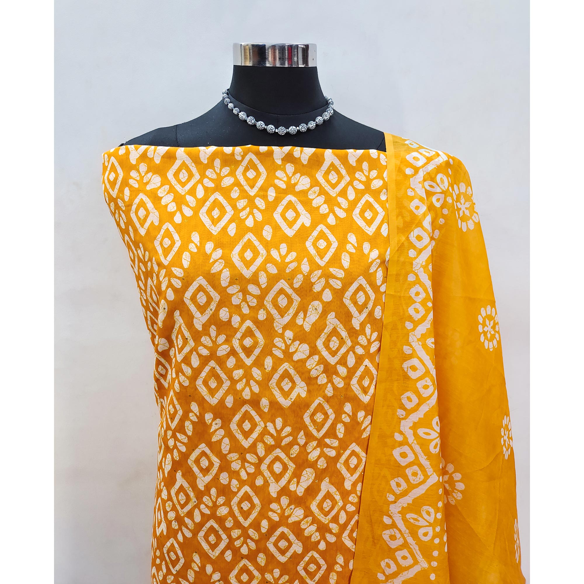 Mustard Yellow Chanderi Silk Dress Material With Traditional Batik Prints